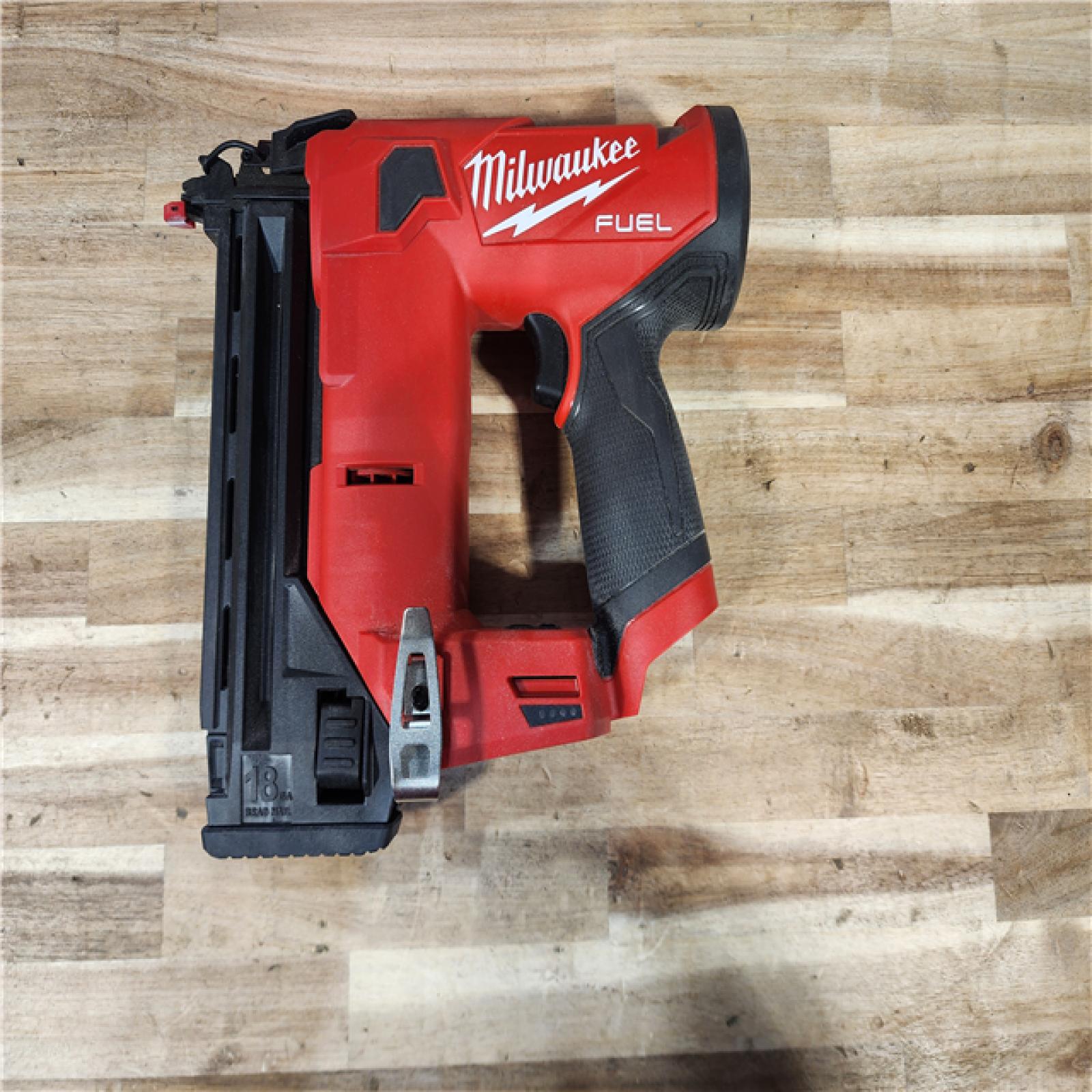 HOUSTON LOCATION - AS-IS Milwaukee FUEL 12-Volt Lithium-Ion Brushless Cordless 18-Gauge 1-1/2 in. Compact Brad Nailer (Tool Only)