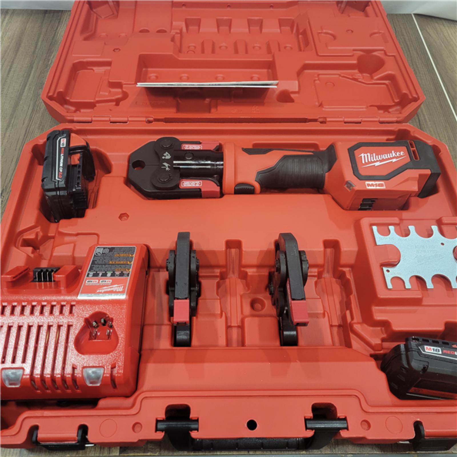 AS-IS Milwaukee M18 18V Lithium-Ion Cordless Short Throw Press Tool Kit with 3 PEX Crimp Jaws (2) 2.0 Ah Batteries and Charger