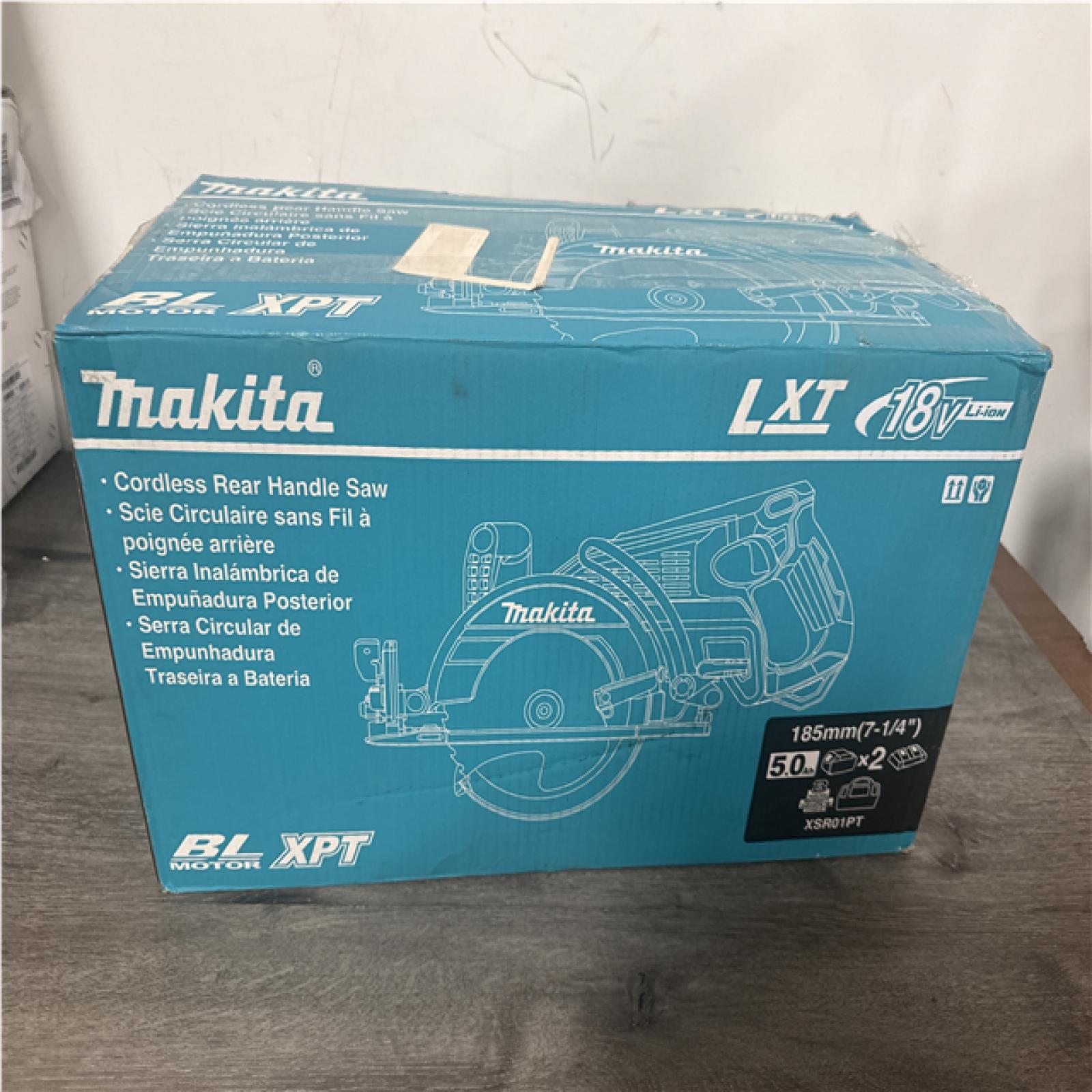 CALIFORNIA LIKE NEW MAKITA CORDLESS REAR HANDLE SAW CHARGER AND 2 BATTERIES