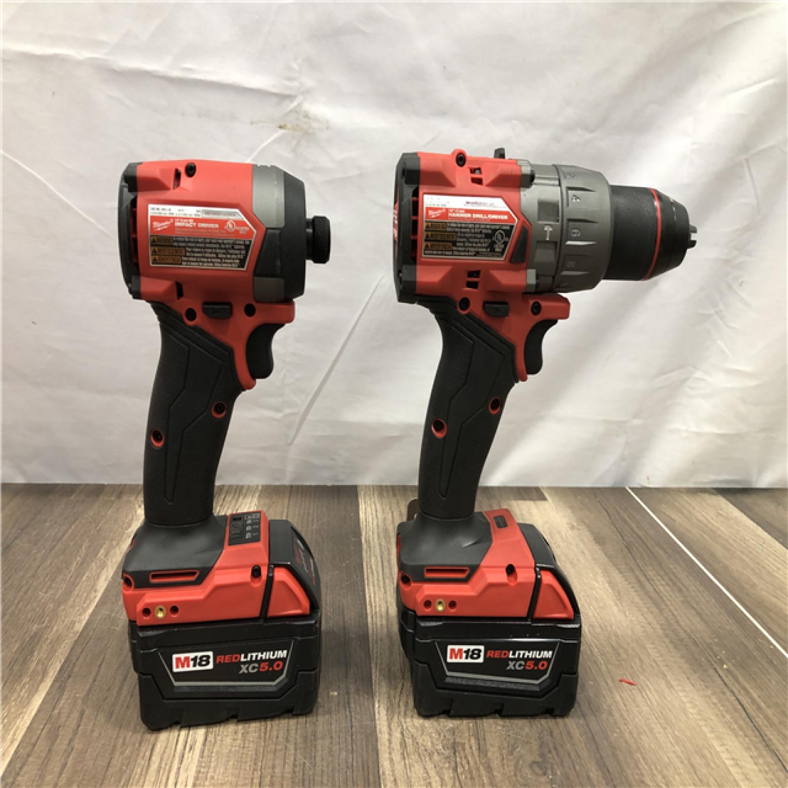 AS-IS Milwaukee FUEL 18V Lithium-Ion Brushless Cordless Hammer Drill and Impact Driver Combo Kit