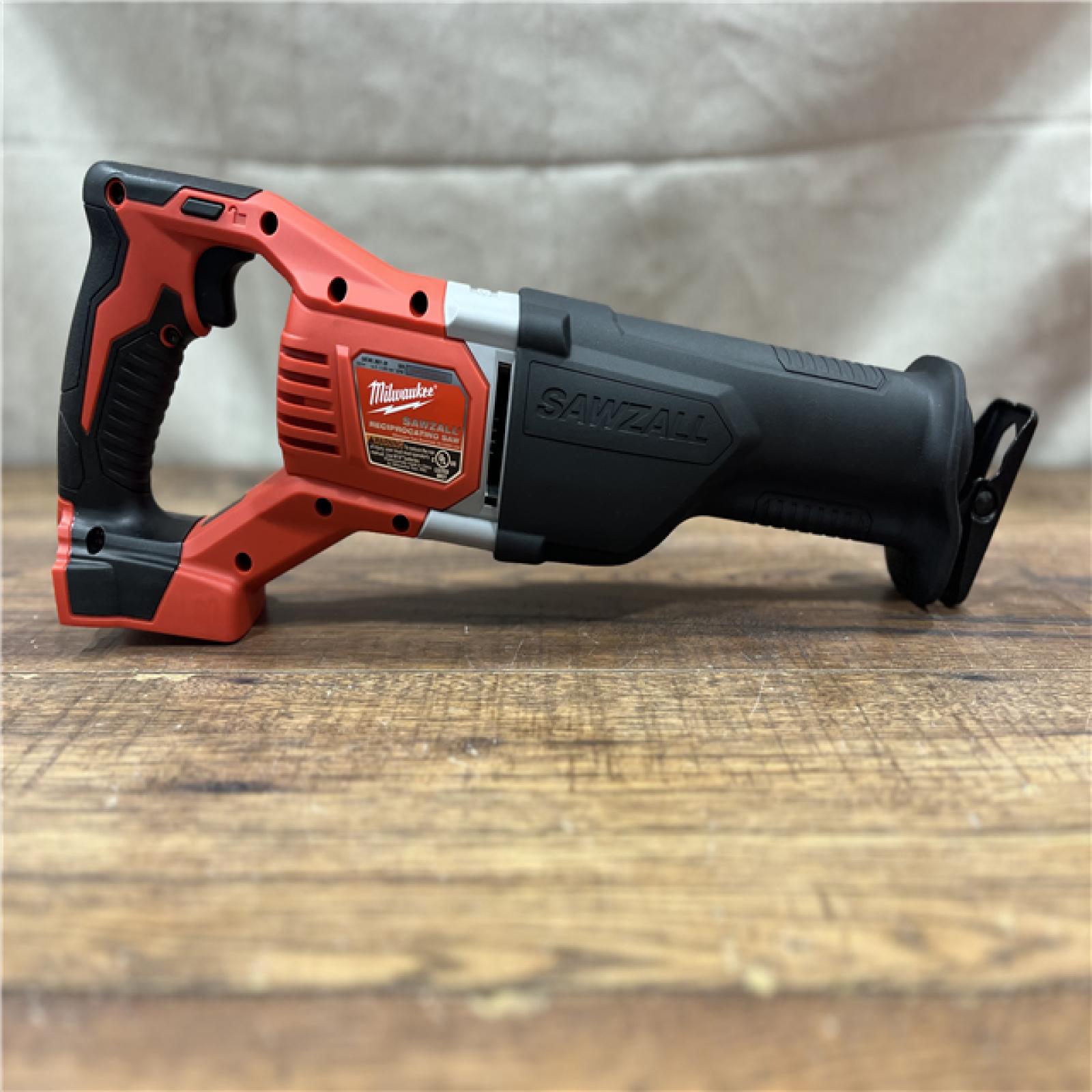 AS-IS MILWAUKEE M18 18V Lithium-Ion Cordless Combo Tool Kit with Two 3.0Ah Batteries, 1-Charger, 1-Tool Bag (4-Tool)