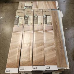 Phoenix TrafficMaster Khaki Oak 4 MIL x 6 in. W x 36 in. L Grip Strip Water Resistant Luxury Vinyl Plank Flooring (1 152 sqft/ 48 case)