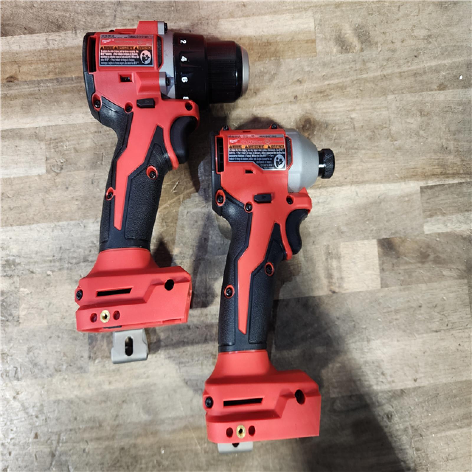 HOUSTON LOCATION - AS-IS Milwaukee M18 18V Lithium-Ion Brushless Cordless Compact Drill/Impact Combo Kit (2-Tool) W/(2) 2.0 Ah Batteries  Charger & Bag