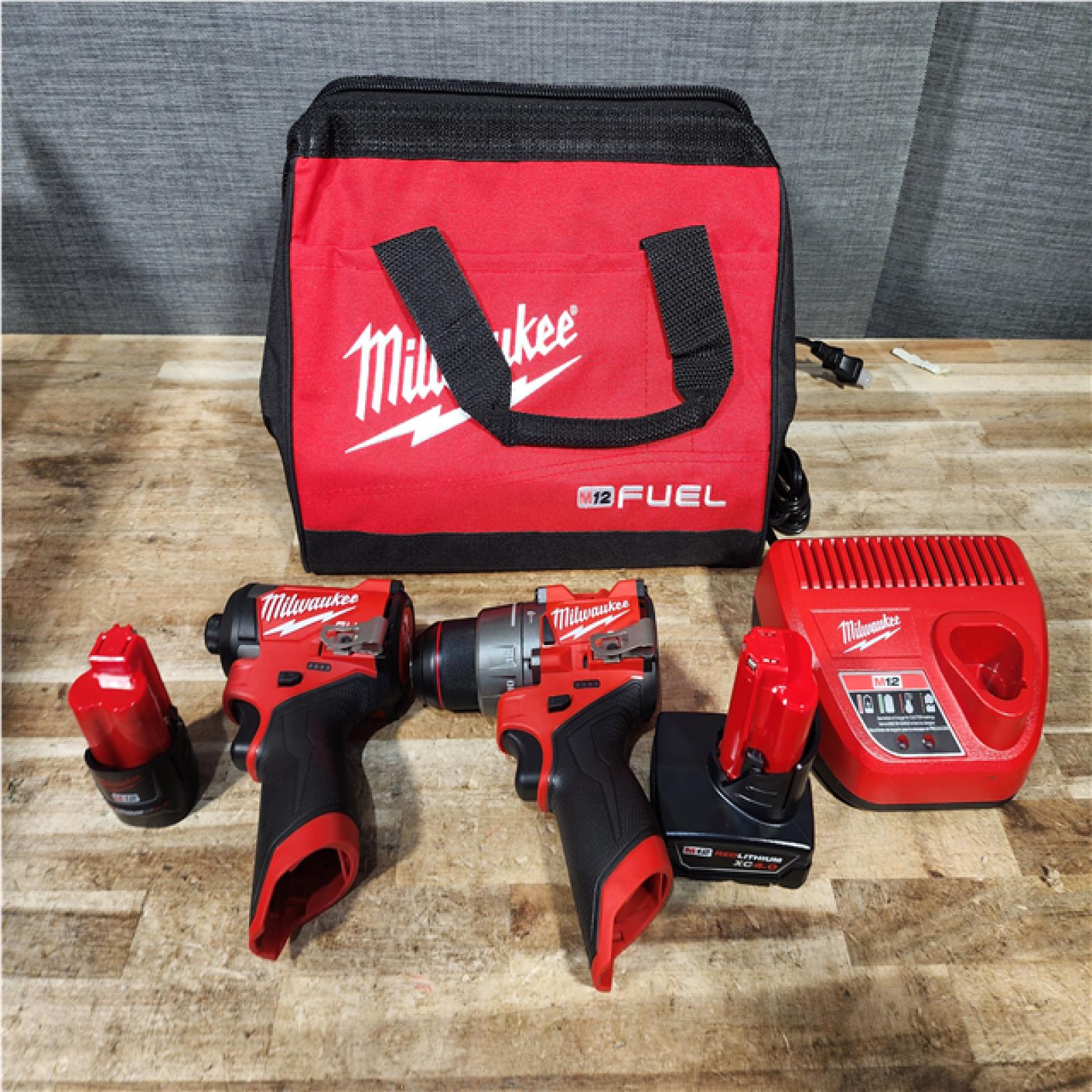 Houston Location AS-IS - Milwaukee FUEL 12-Volt Lithium-Ion Brushless Cordless Hammer Drill and Impact Driver Combo Kit