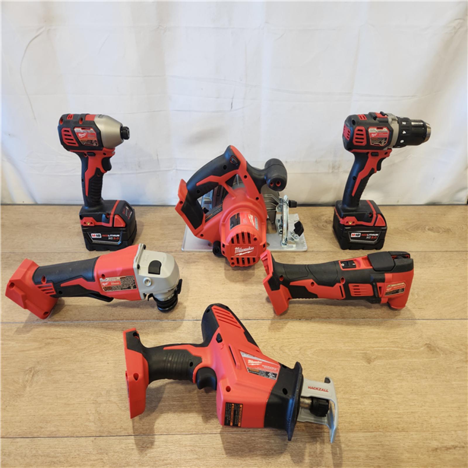 AS-IS- M18 18-Volt Lithium-Ion Cordless Combo Kit 7-Tool with 2-Batteries  Charger and Tool Bag