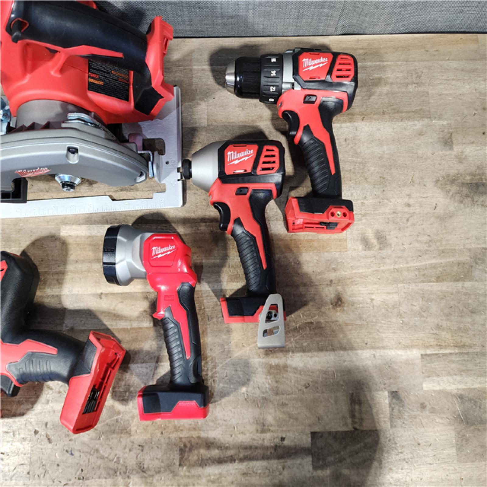 HOUSTON LOCATION - AS-IS Milwaukee M18 18-Volt Lithium-Ion Cordless Combo Tool Kit (5-Tool) with (1) 3.0Ah and (1) 1.5Ah Battery  (1) Charger  (1) Tool Bag