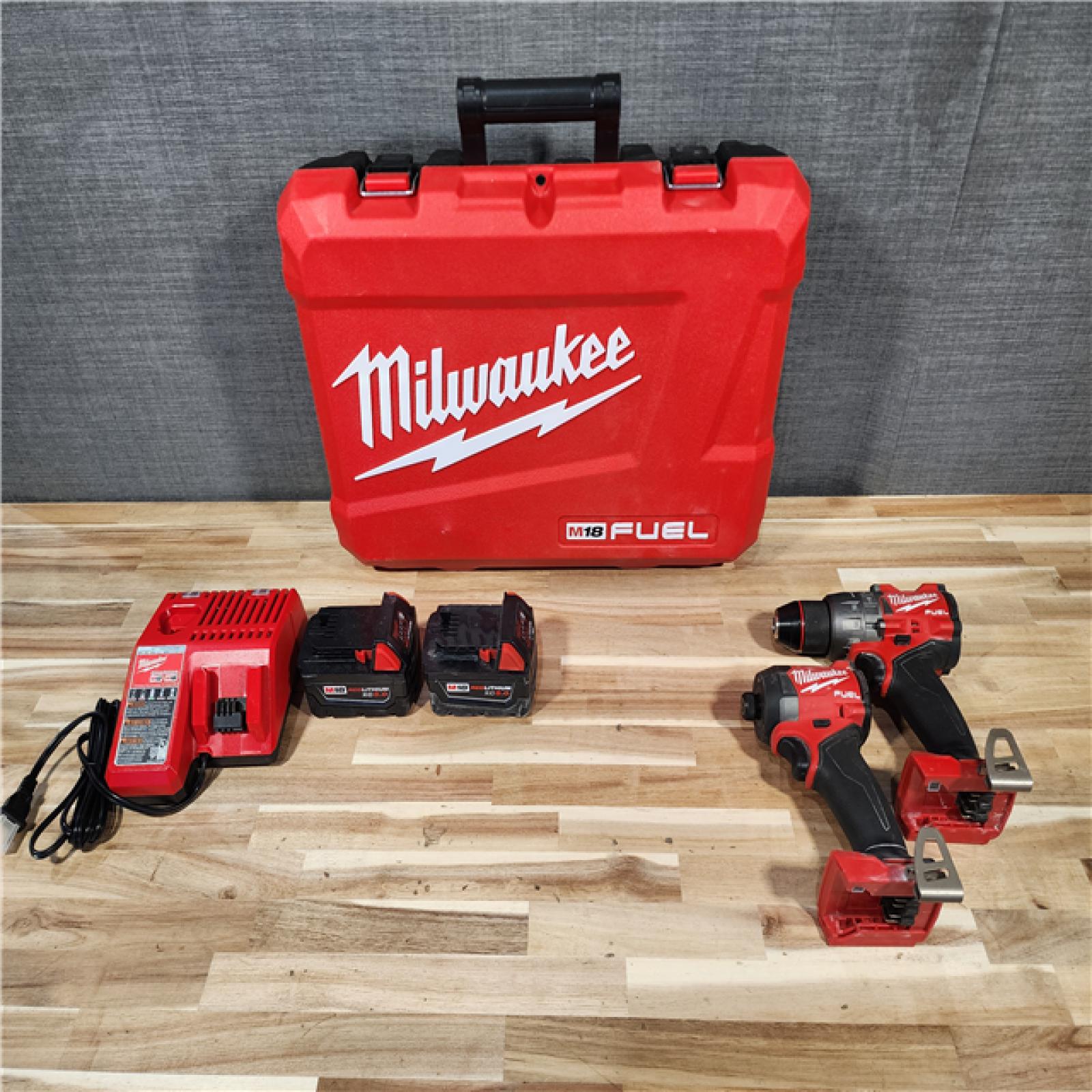 HOUSTON LOCATION - AS-IS Milwaukee  FUEL 18V Lithium-Ion Brushless Cordless Hammer Drill and Impact Driver Combo Kit