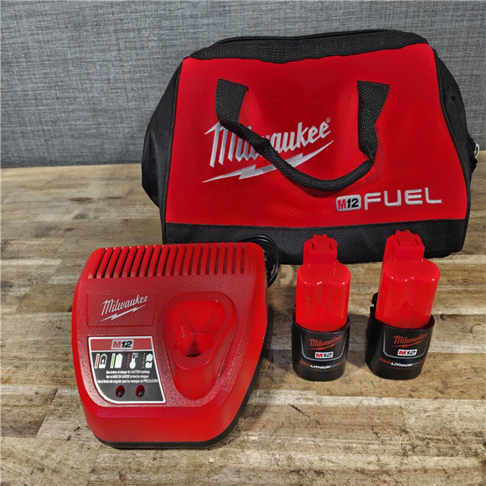 HOUSTON LOCATION - AS-IS Milwaukee FUEL 12V Lithium-Ion Cordless 3/8 in. Ratchet and 1/4 in. Impact Driver Kit