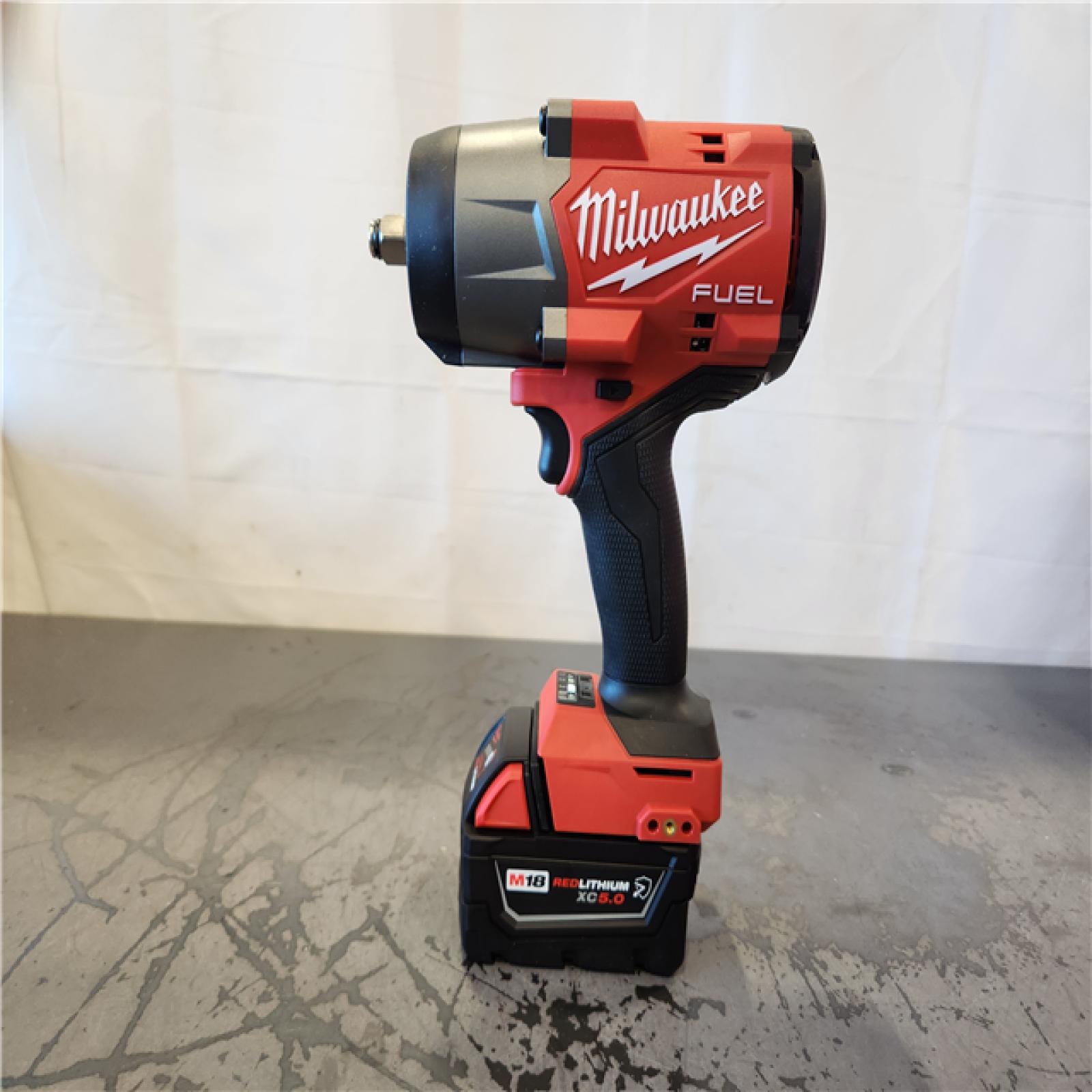 AS-IS- Milwaukee M18 1/2 in. Cordless Brushless High Torque Impact Wrench Kit (Battery & Charger)