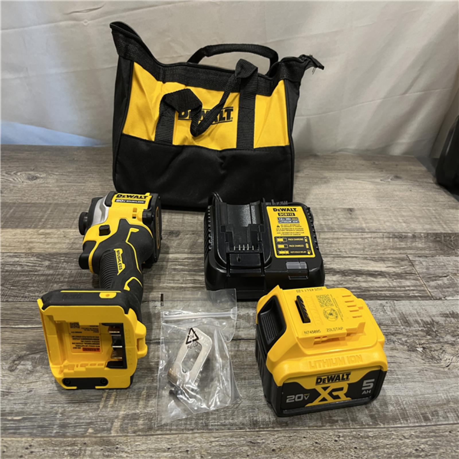 AS-IS DEWALT ATOMIC 20V MAX Lithium-Ion Cordless 1/4 in. Brushless Impact Driver Kit