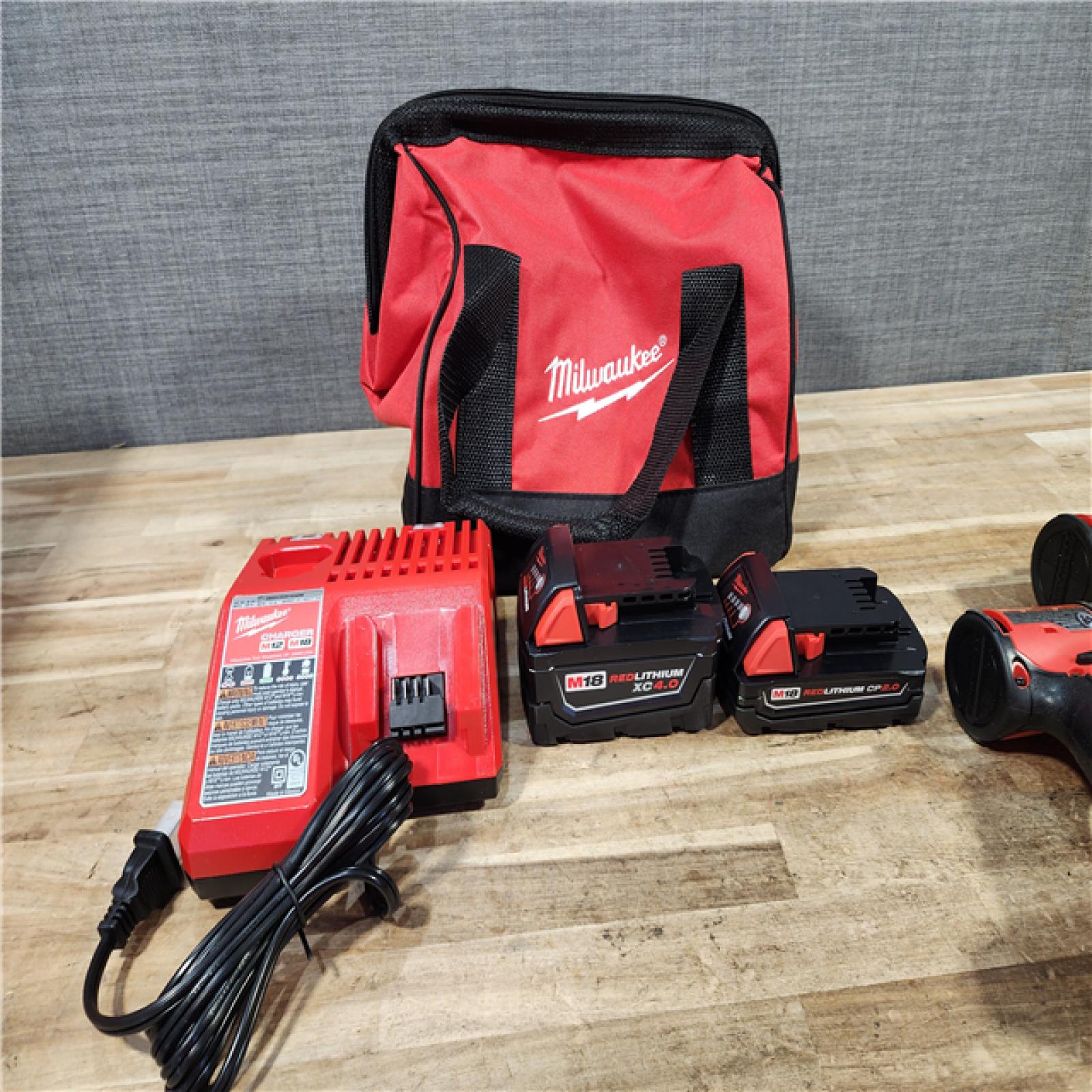 HOUSTON LOCATION - AS - IS Milwaukee 18-Volt Lithium-Ion Brushless Cordless Compact Hammer Drill/Impact Combo Kit