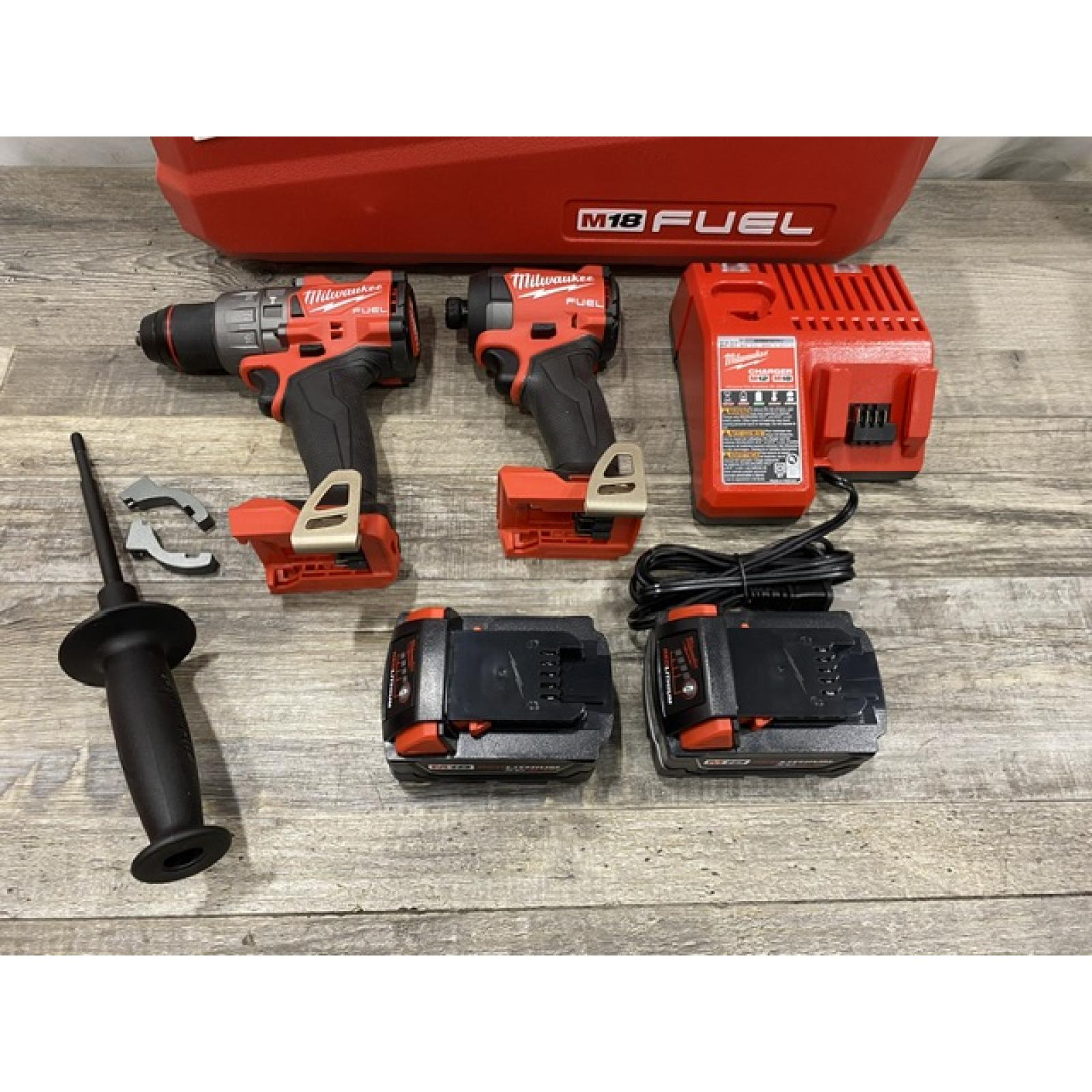 AS-IS Milwaukee FUEL 18V Lithium-Ion Brushless Cordless Hammer Drill and Impact Driver Combo Kit
