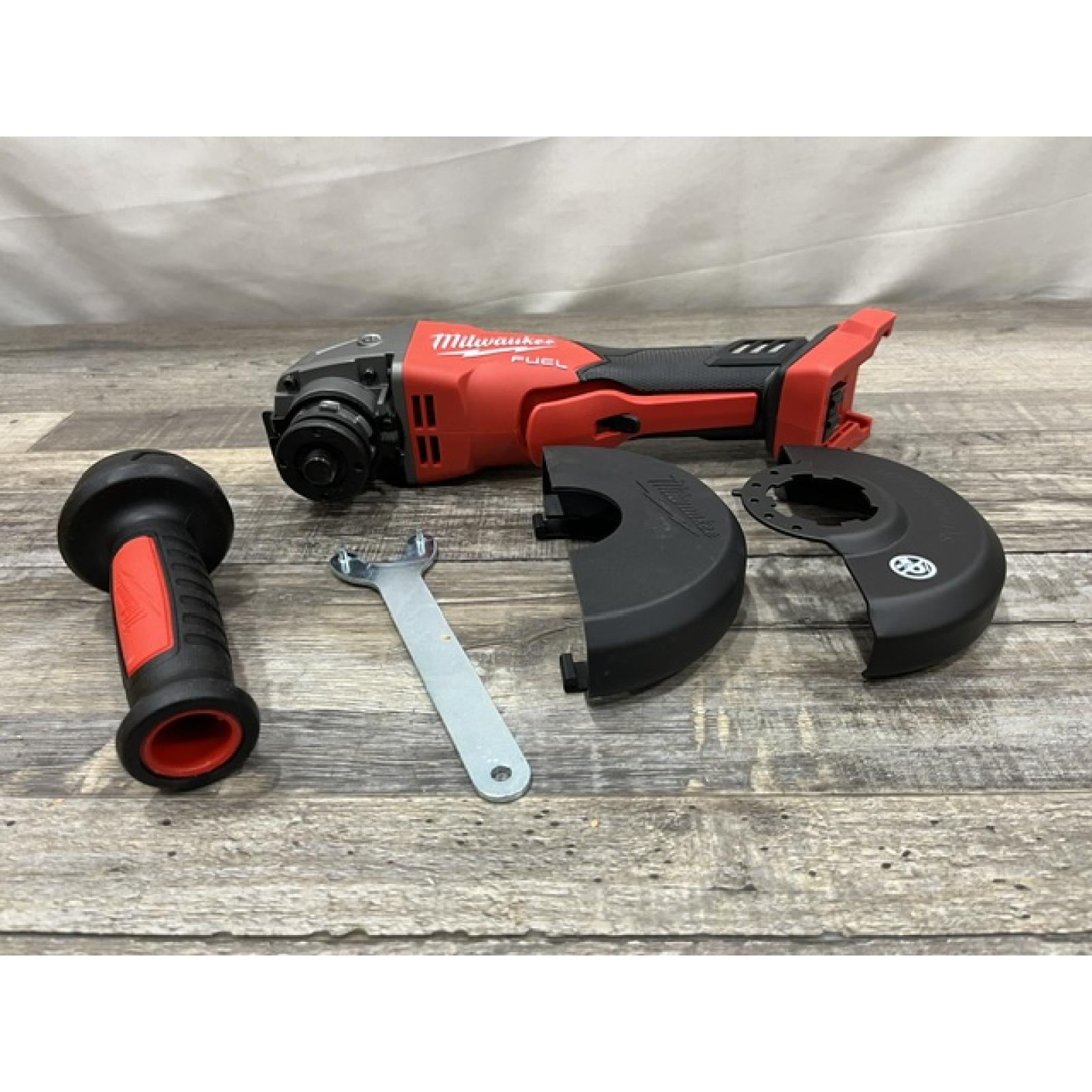 AS-IS Milwaukee FUEL 18V Lithium-Ion Brushless Cordless 4-1/2 in./5 in. Grinder w/Paddle Switch (Tool-Only)