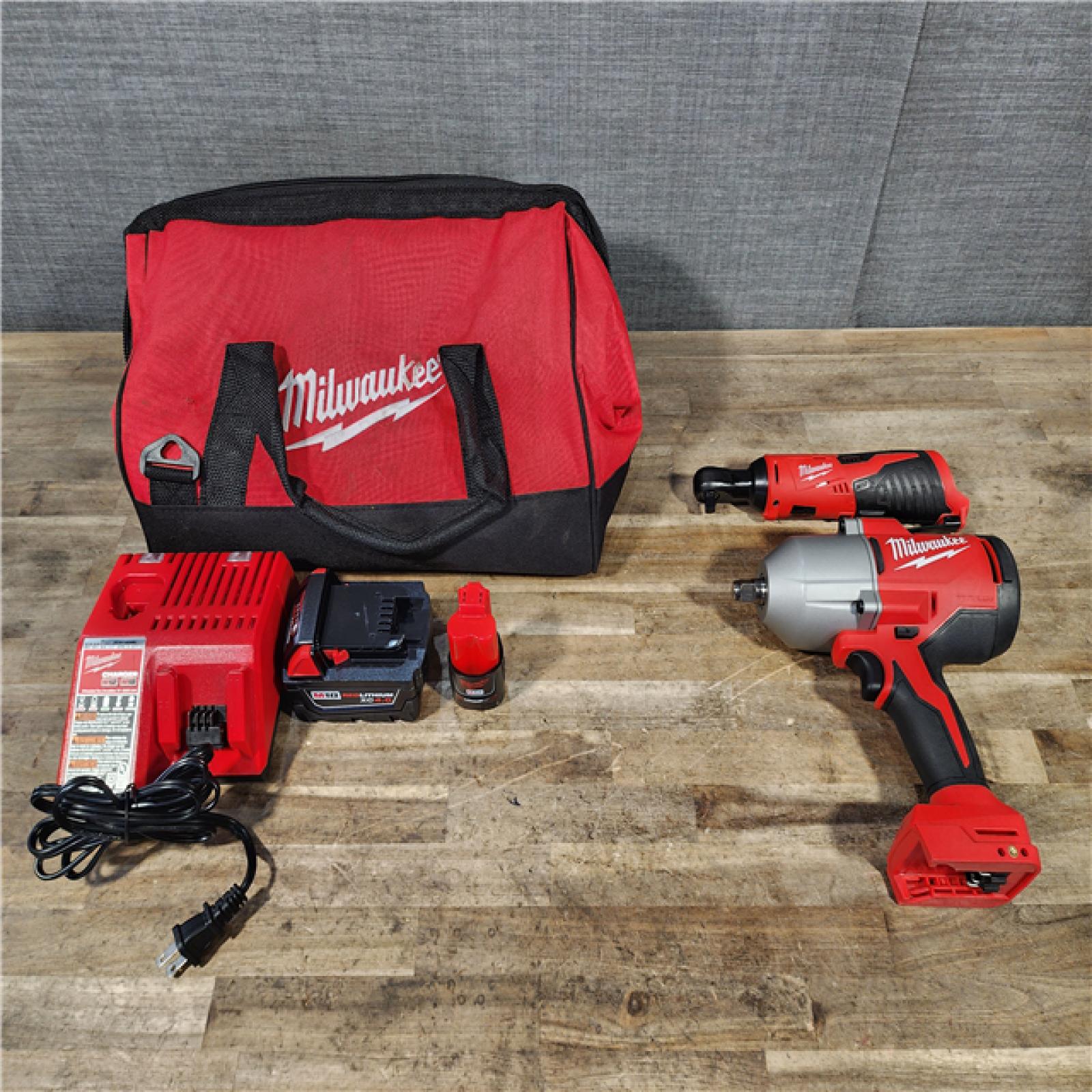 HOUSTON LOCATION - AS-IS Milwaukee 12/18V Lithium-Ion Cordless 3/8 in. Ratchet and 1/2 in. High Torque Impact Wrench with Friction Ring Combo Kit