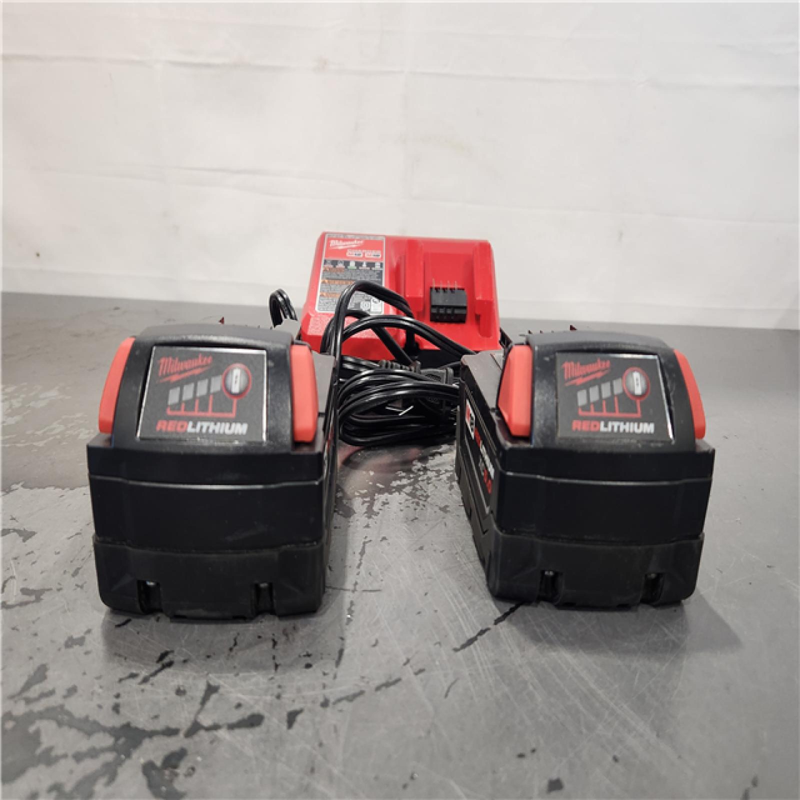AS-IS- Milwaukee 18-Volt Lithium-Ion XC Starter Kit with Two 5.0Ah Batteries and Charger