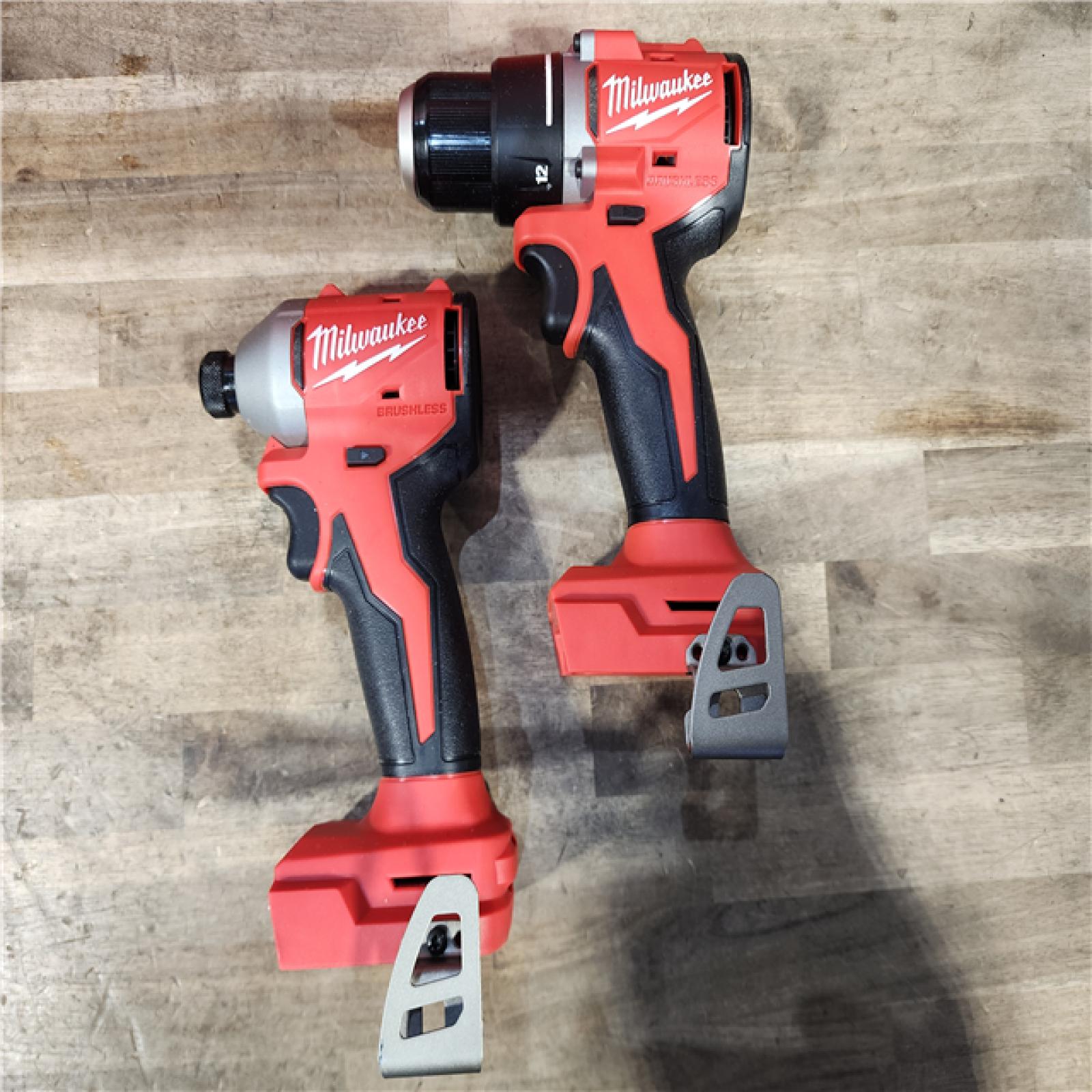 HOUSTON LOCATION - AS-IS Milwaukee M18 18V Lithium-Ion Brushless Cordless Compact Drill/Impact Combo Kit (2-Tool) W/(2) 2.0 Ah Batteries  Charger & Bag