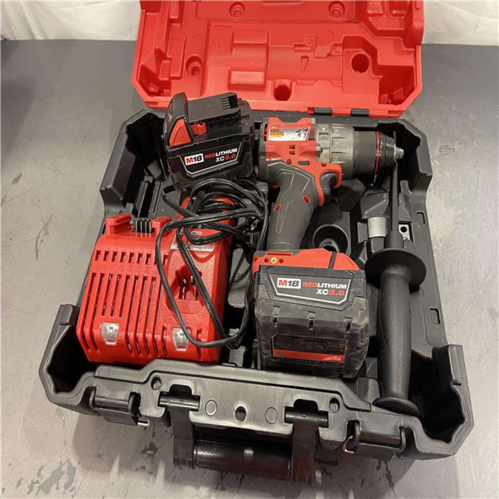 AS-IS - Milwaukee M18 FUEL 18V Lithium-Ion Brushless Cordless 1/2 in. Hammer Drill Driver Kit