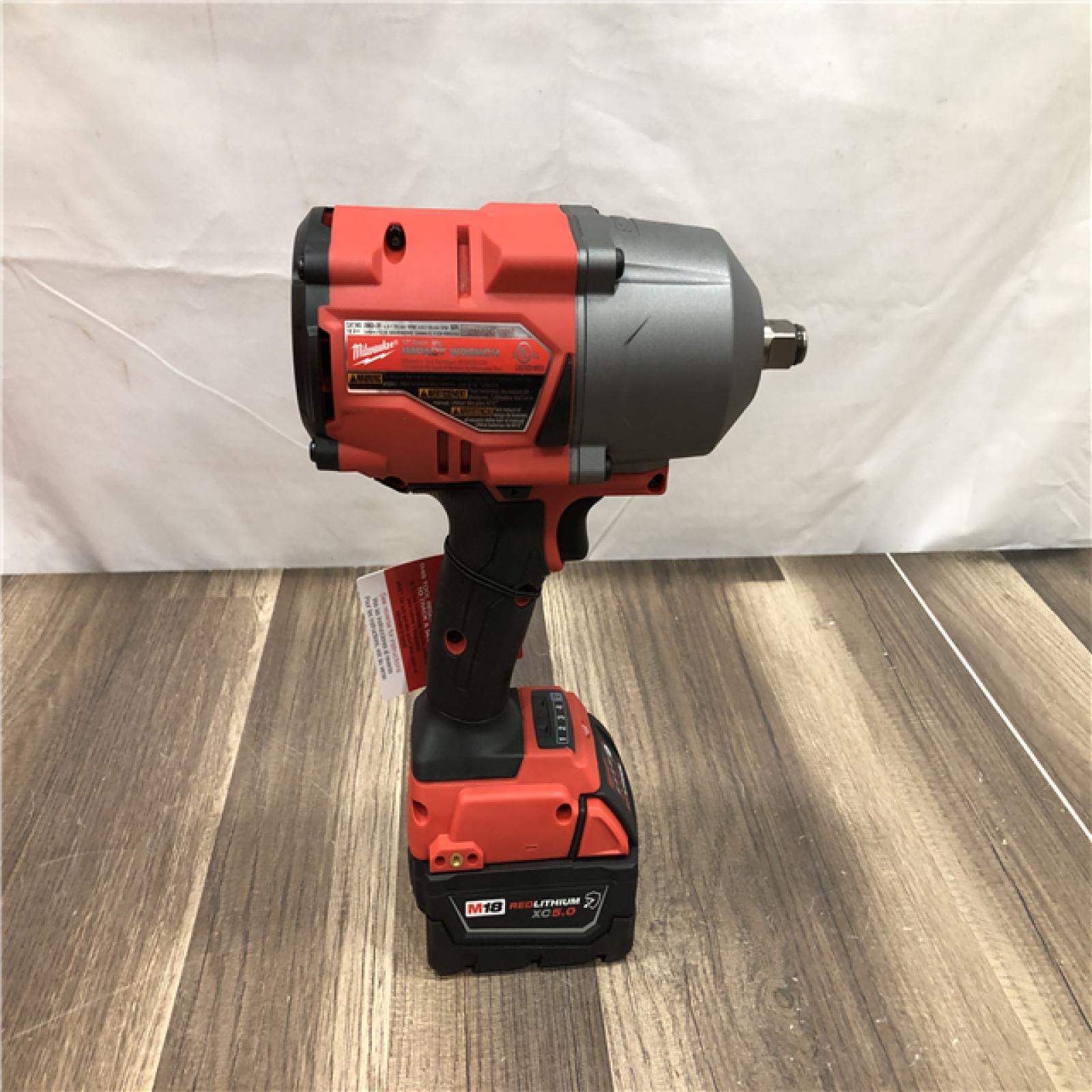 AS-IS Milwaukee FUEL ONE-KEY 18V Li-Ion Brushless Cordless 1/2 in. High-Torque Impact Wrench with Friction Ring  Resistant Batteries
