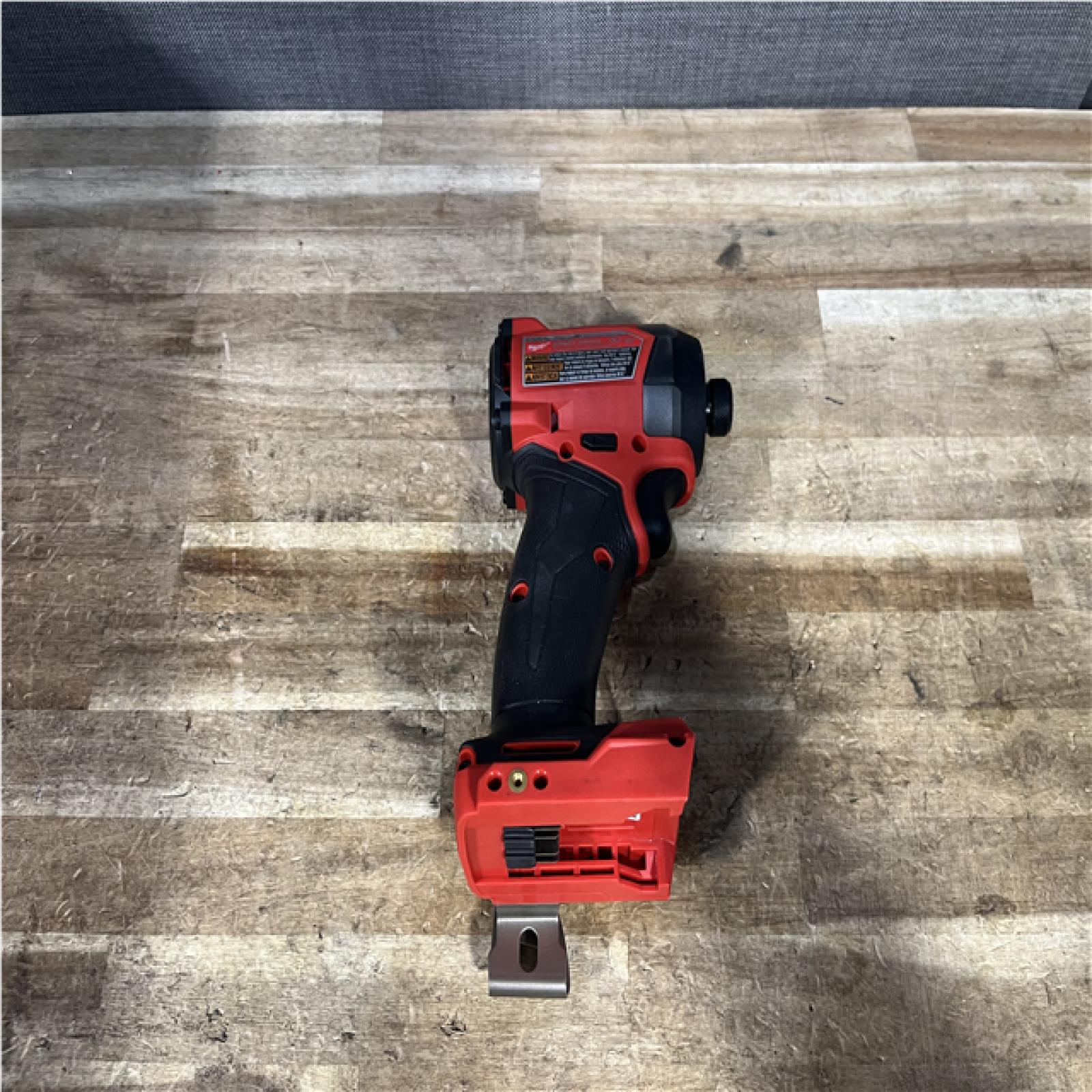 Houston Location AS-IS Milwaukee FUEL 18V Lithium-Ion Brushless Cordless 1/4 in. Hex Impact Driver (Tool-Only)