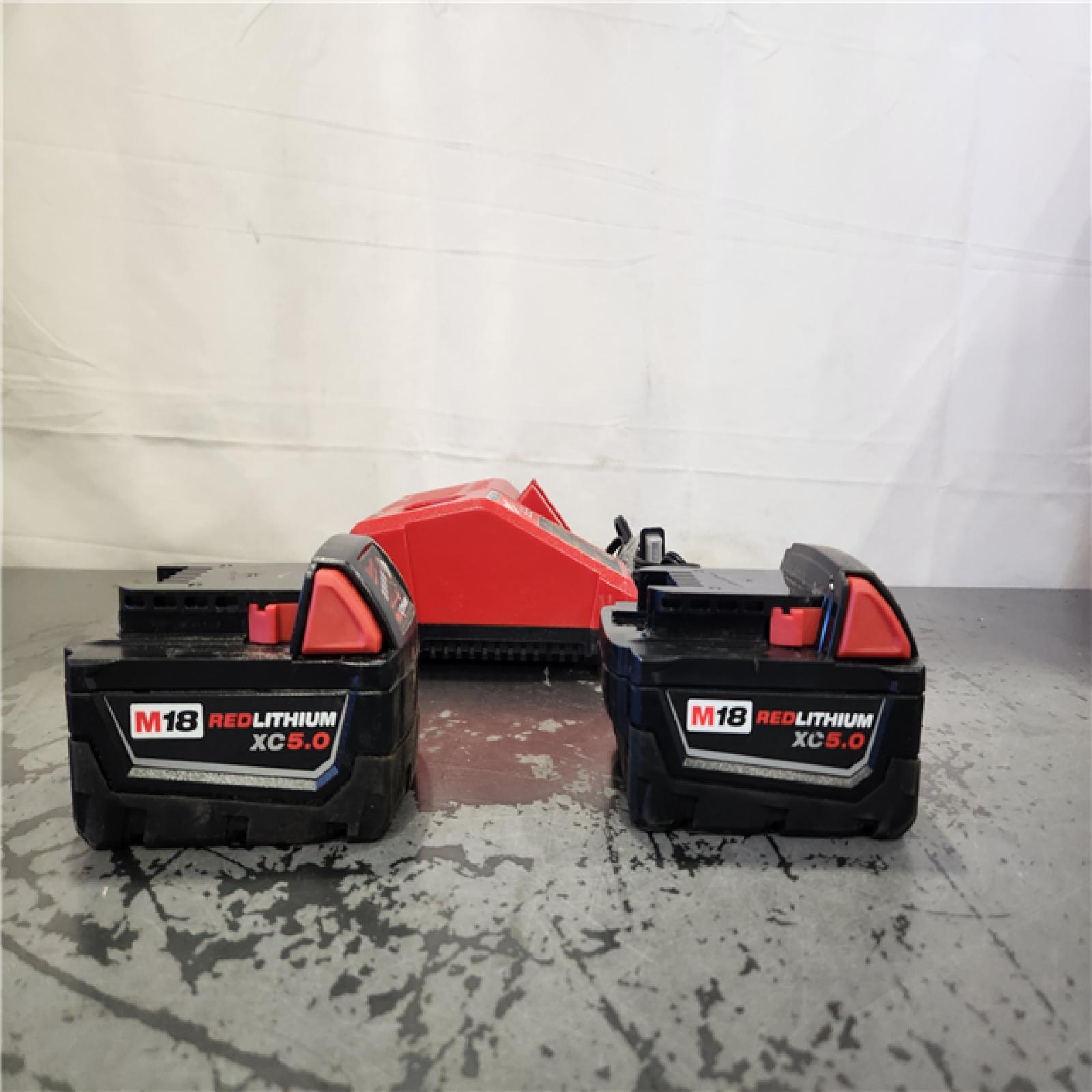 AS-IS- Milwaukee 18-Volt Lithium-Ion XC Starter Kit with Two 5.0Ah Batteries and Charger