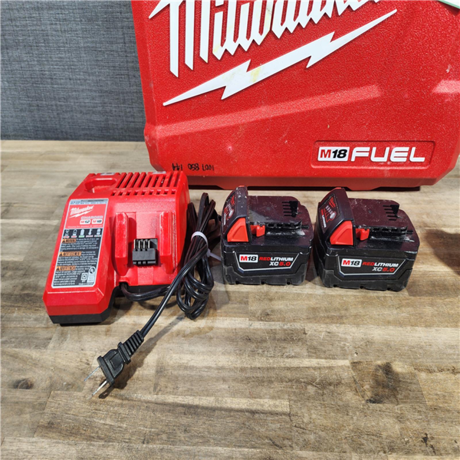 HOUSTON LOCATION - AS-IS MILWAUKEE M18 FUEL 18V Lithium-Ion Brushless Cordless Hammer Drill and Impact Driver Combo Kit (2-Tool) with 2 Batteries