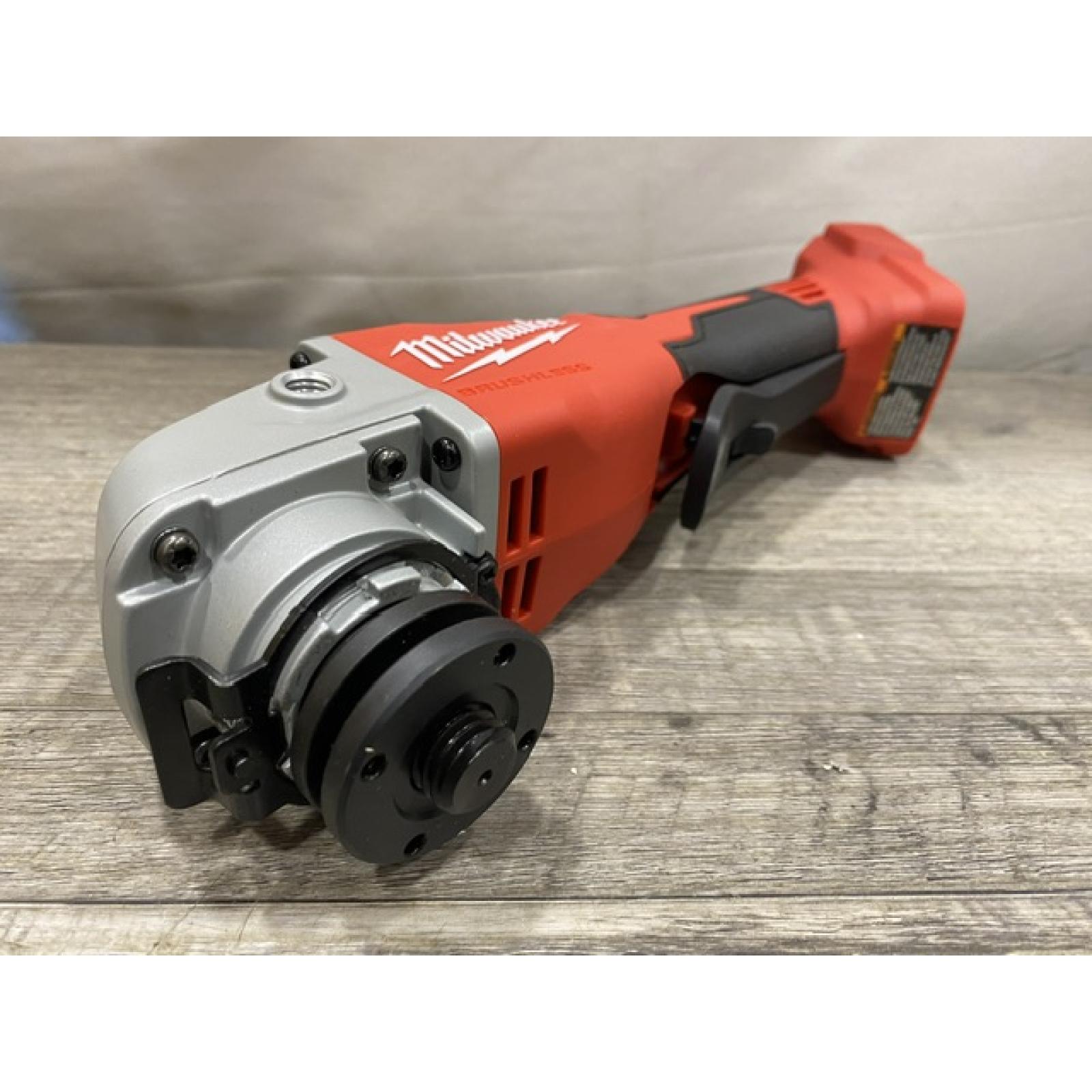 AS-IS Milwaukee 18V Lithium-Ion Brushless Cordless 4-1/2 in./5 in. Grinder w/Paddle Switch (Tool-Only)