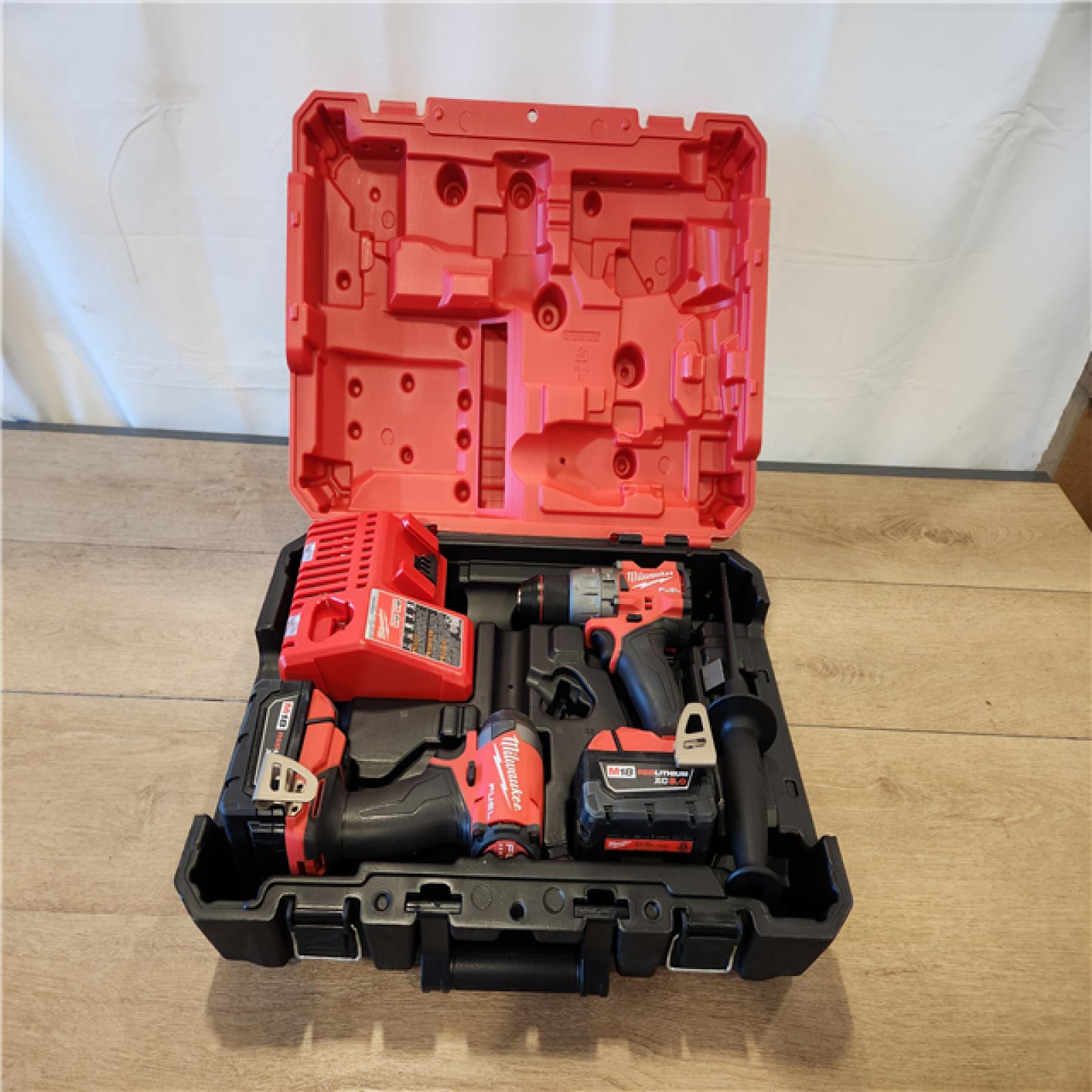 AS-IS- Milwaukee FUEL 18V Lithium-Ion Brushless Cordless Hammer Drill and Impact Driver Combo Kit