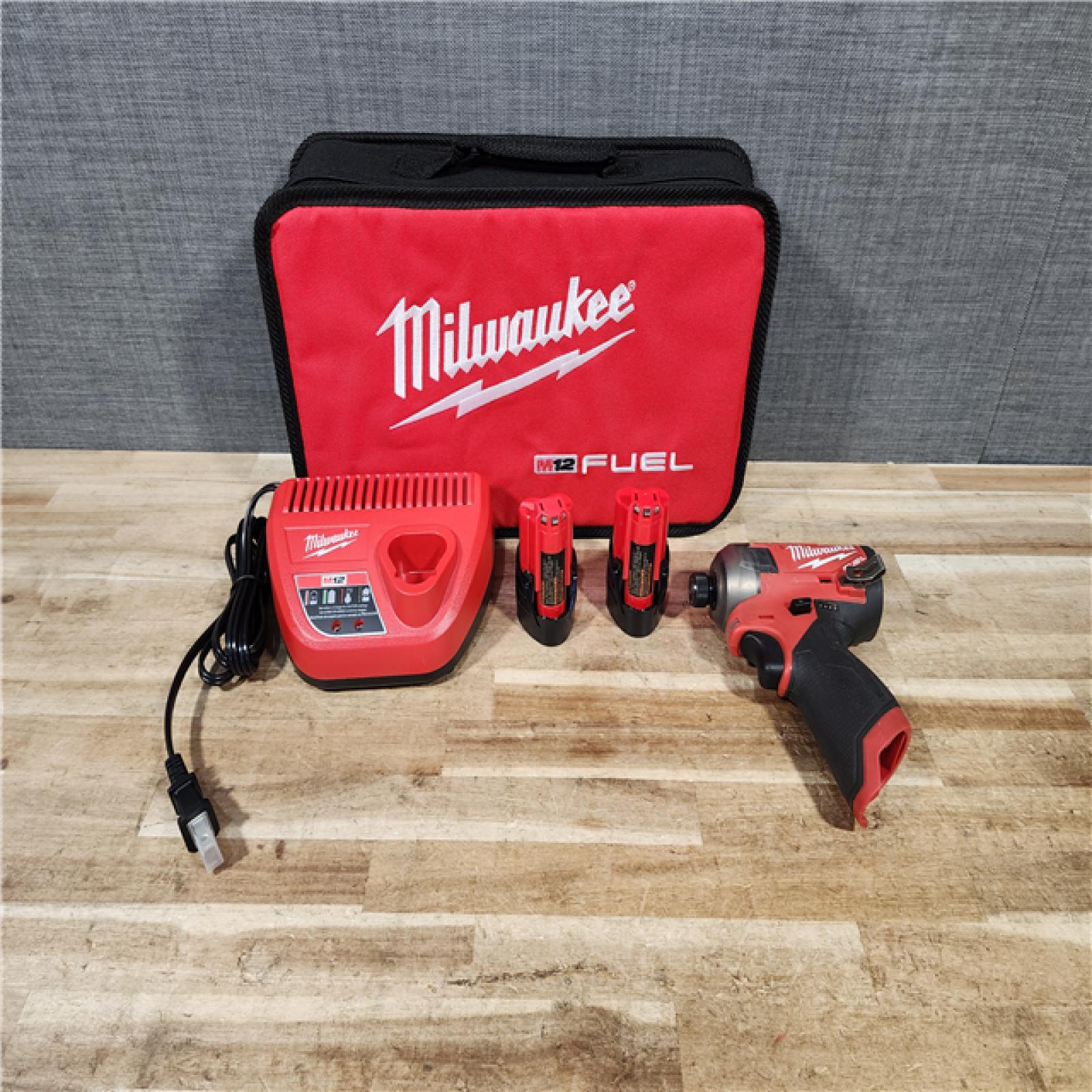 HOUSTON LOCATION - AS - IS Milwaukee FUEL SURGE 12V Lithium-Ion Brushless Cordless 1/4 in. Hex Impact Driver Compact Kit