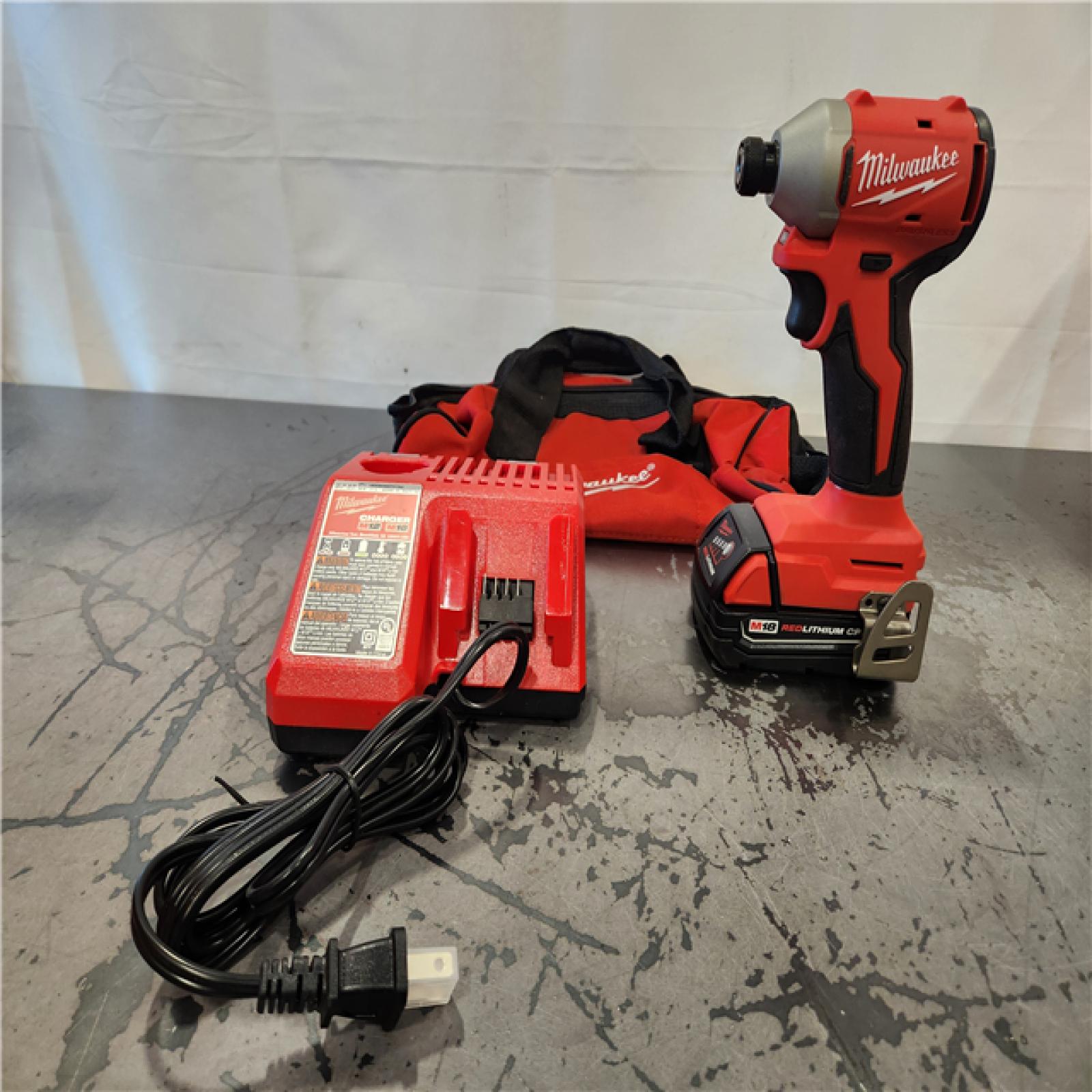 AS-IS- Milwaukee M18 Compact Brushless 1/4  Hex Impact Driver Kit