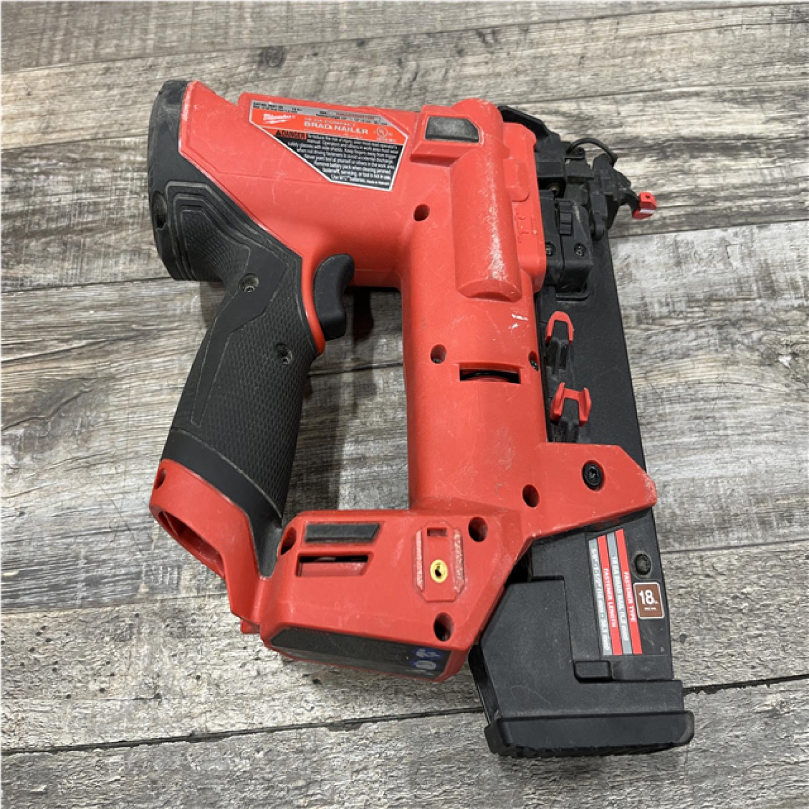 AS-IS Milwaukee FUEL 12-Volt Lithium-Ion Brushless Cordless 18-Gauge 1-1/2 in. Compact Brad Nailer (Tool Only)