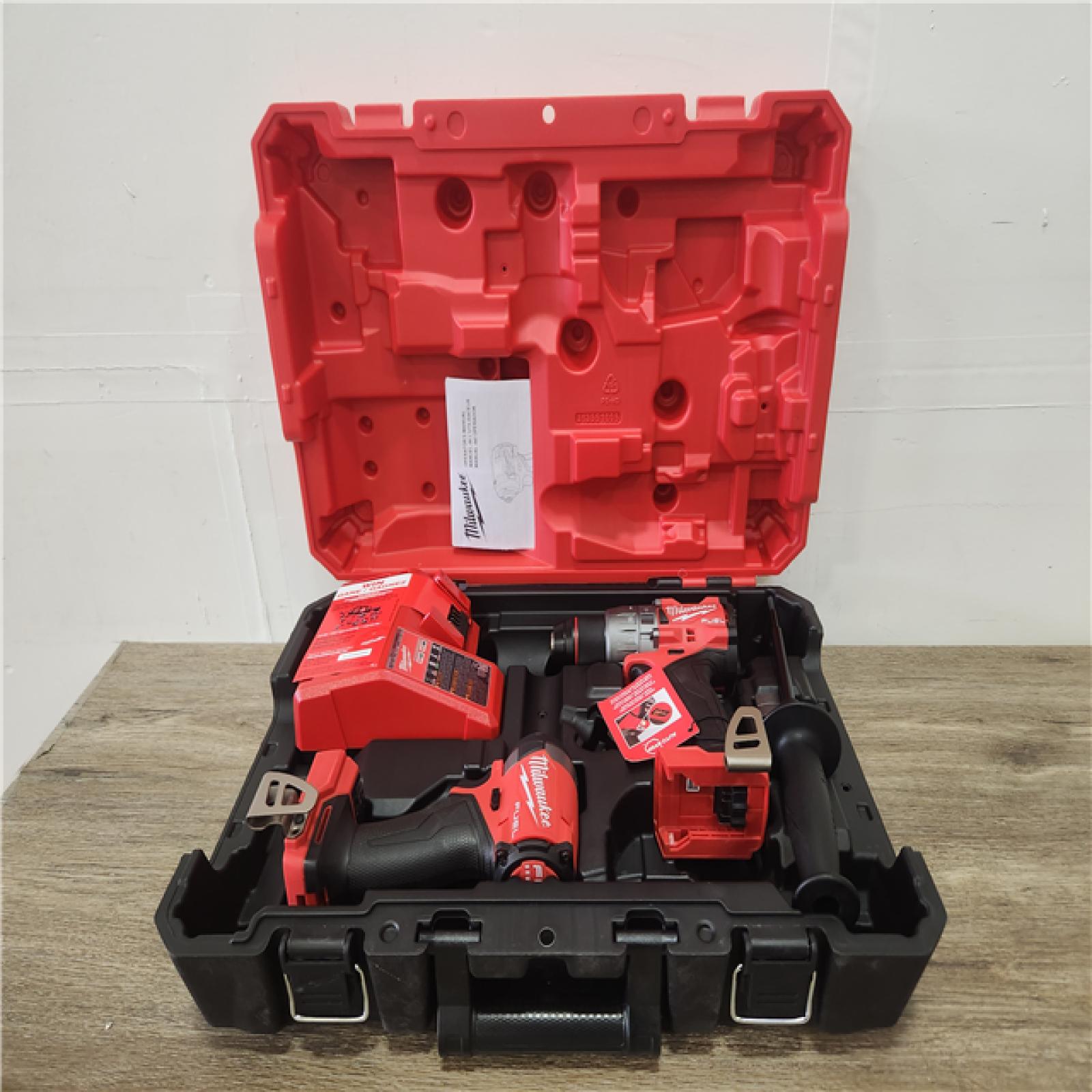 Phoenix Location NEW Milwaukee M18 FUEL 18V Lithium-Ion Brushless Cordless Hammer Drill and Impact Driver Combo Kit (2-Tool) with 2 Batteries