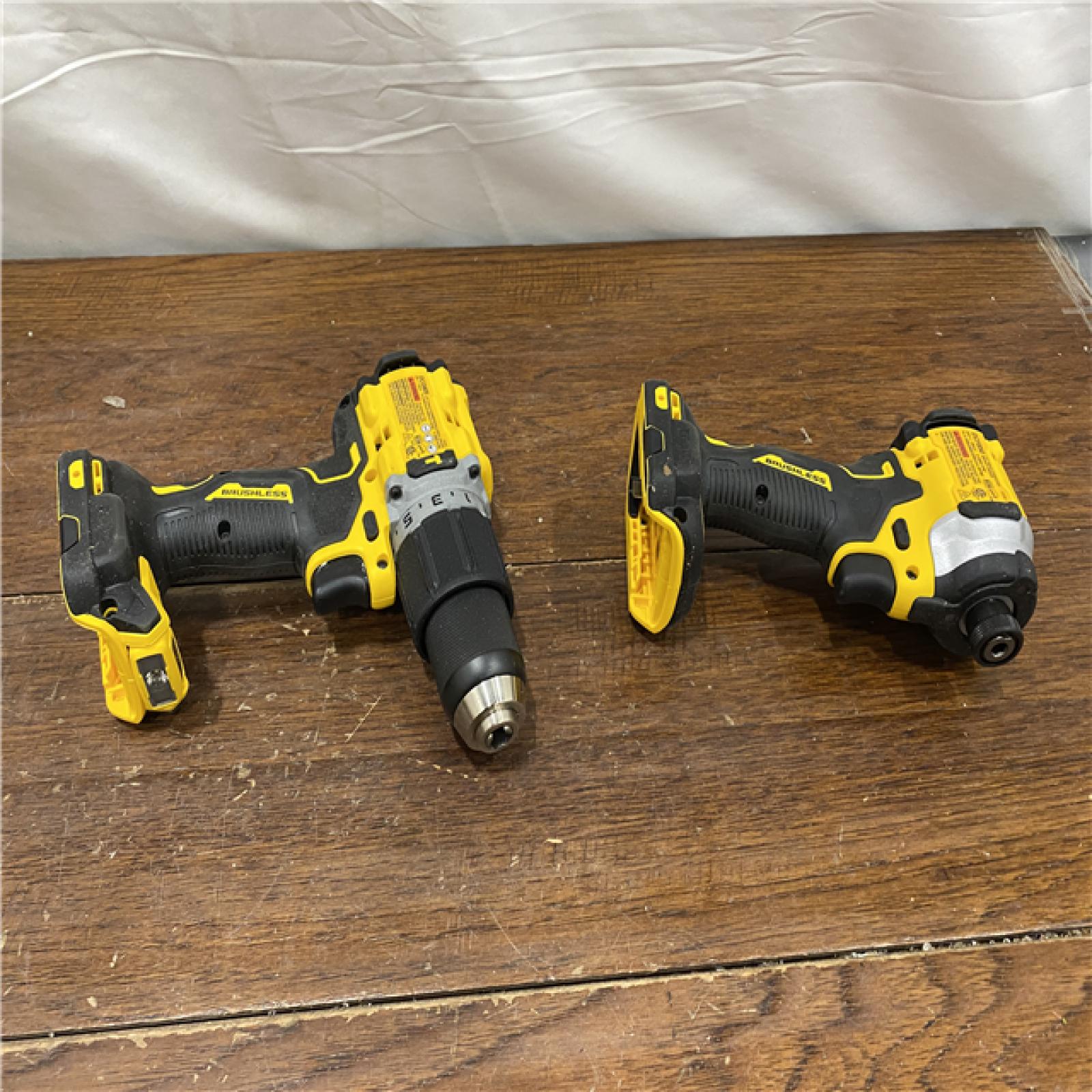 AS-IS DEWALT 20V MAX XR Hammer Drill and ATOMIC Impact Driver 2 Tool Cordless Combo Kit with (2) 4.0Ah Batteries, Charger, and Bag