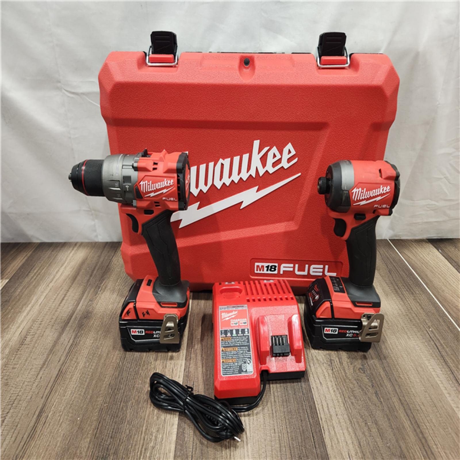 AS-IS- MILWAUKEE FUEL 18V Lithium-Ion Brushless Cordless Hammer Drill and Impact Driver Combo Kit