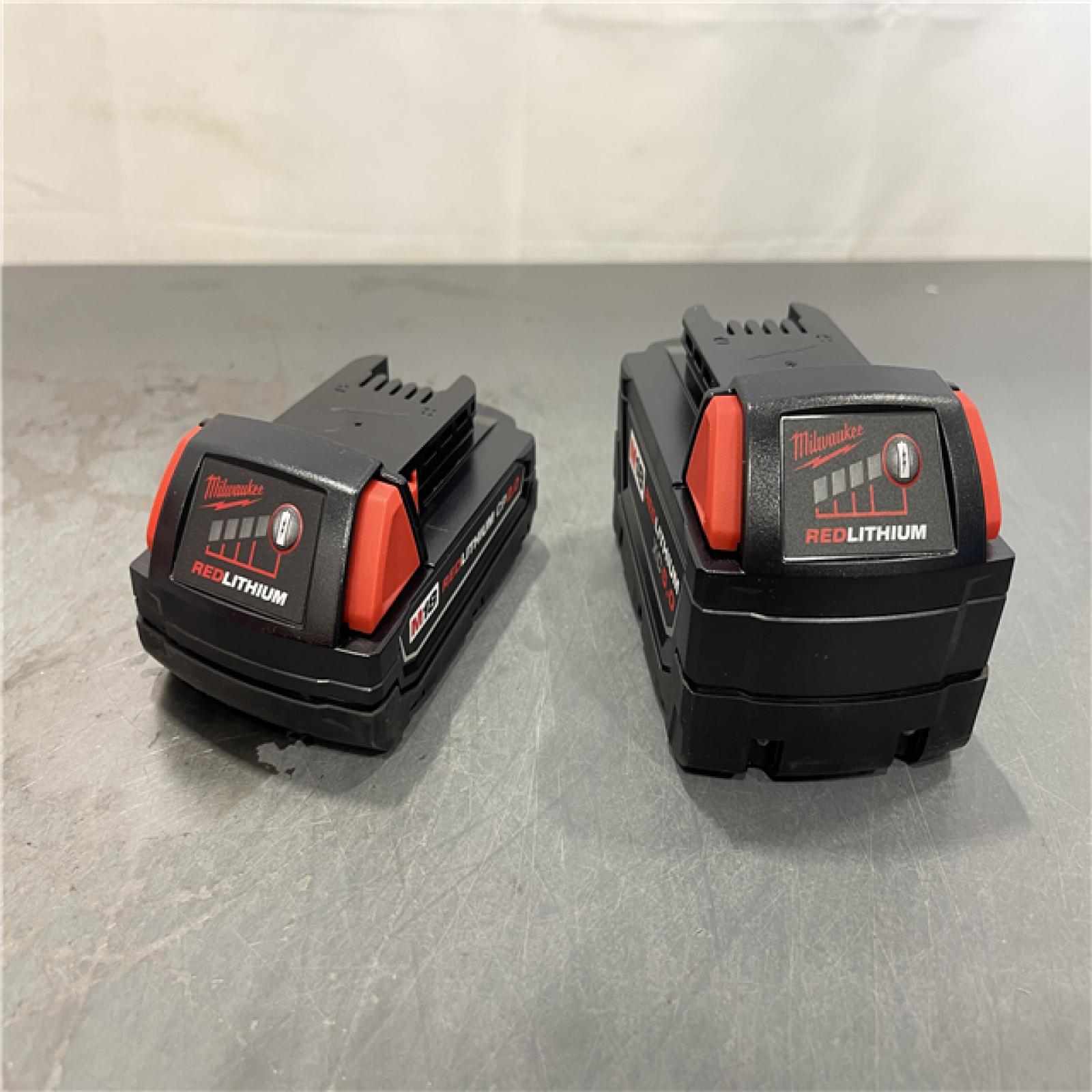AS-IS - Milwaukee M18 18-Volt Lithium-Ion Starter Kit with One 5.0 Ah and One 2.0 Ah Battery and Charger