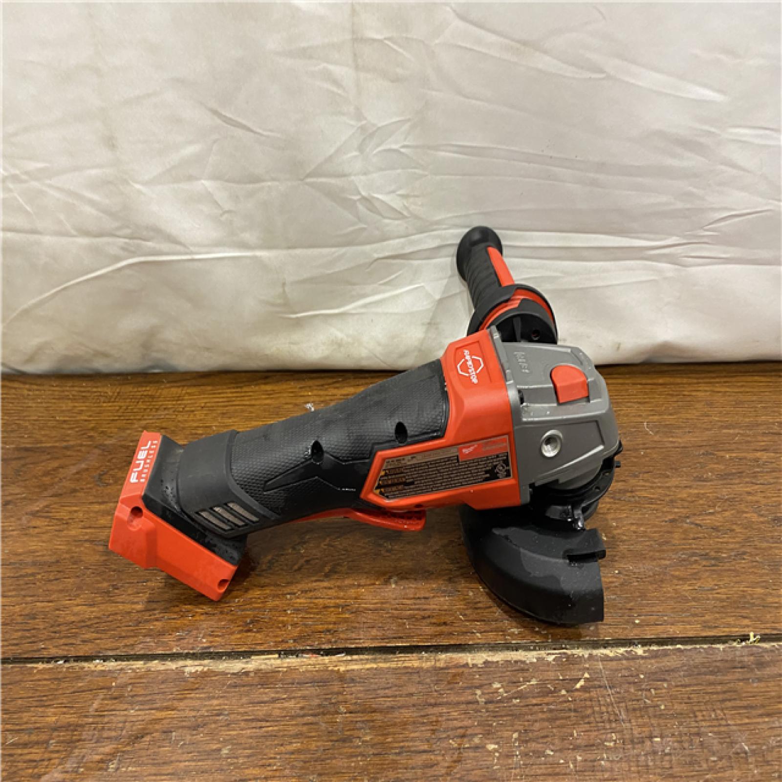 AS-IS Milwaukee 2880-20 M18 FUEL 18-Volt Lithium-Ion Brushless Cordless 4-1/2 in./5 in. Grinder W/Paddle Switch (Tool-Only)