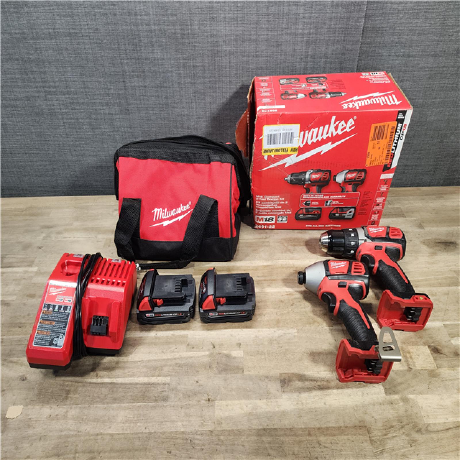 HOUSTON LOCATION - AS-IS Milwaukee 18V Cordless Brushed 2-Tool Drill/Driver and Impact Driver Kit
