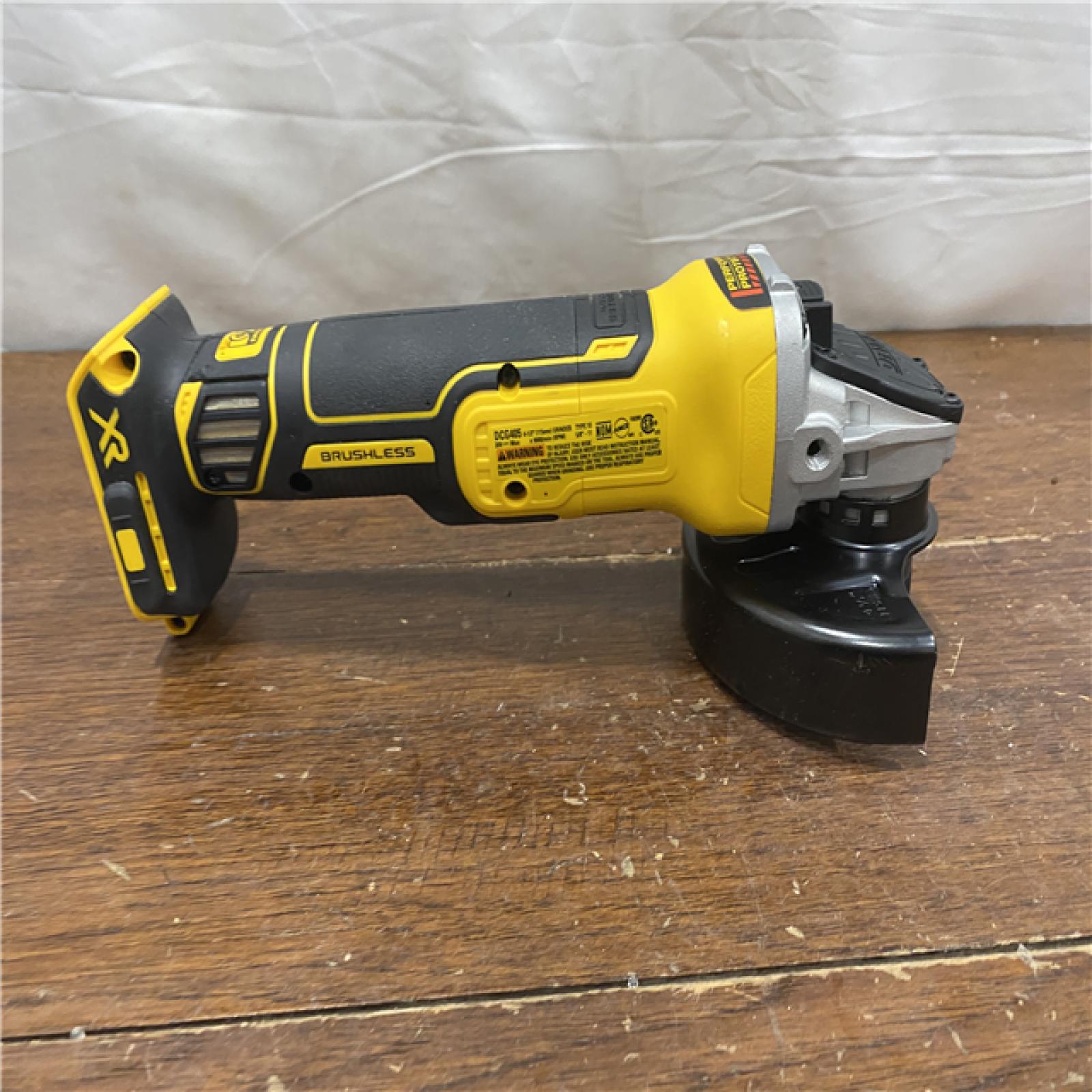 AS-IS DeWalt DCG405B 20V Max XR 4.5-Inch Slide Switch Small Angle Grinder (Tool Only)