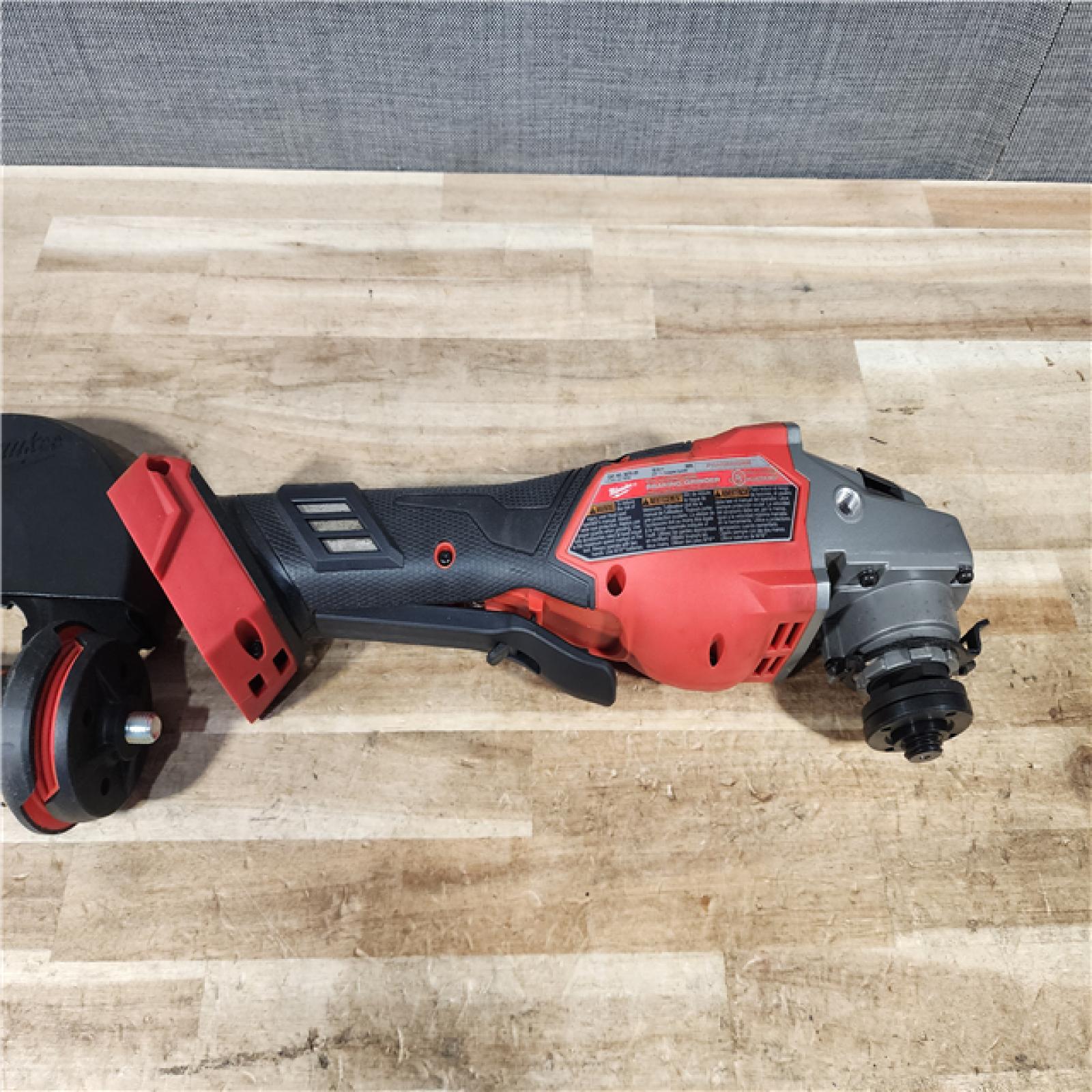 HOUSTON LOCATION - AS - IS Milwaukee FUEL 18-Volt Lithium-Ion Brushless Cordless 4-1/2 in./6 in. Braking Grinder with Paddle Switch (Tool-Only)