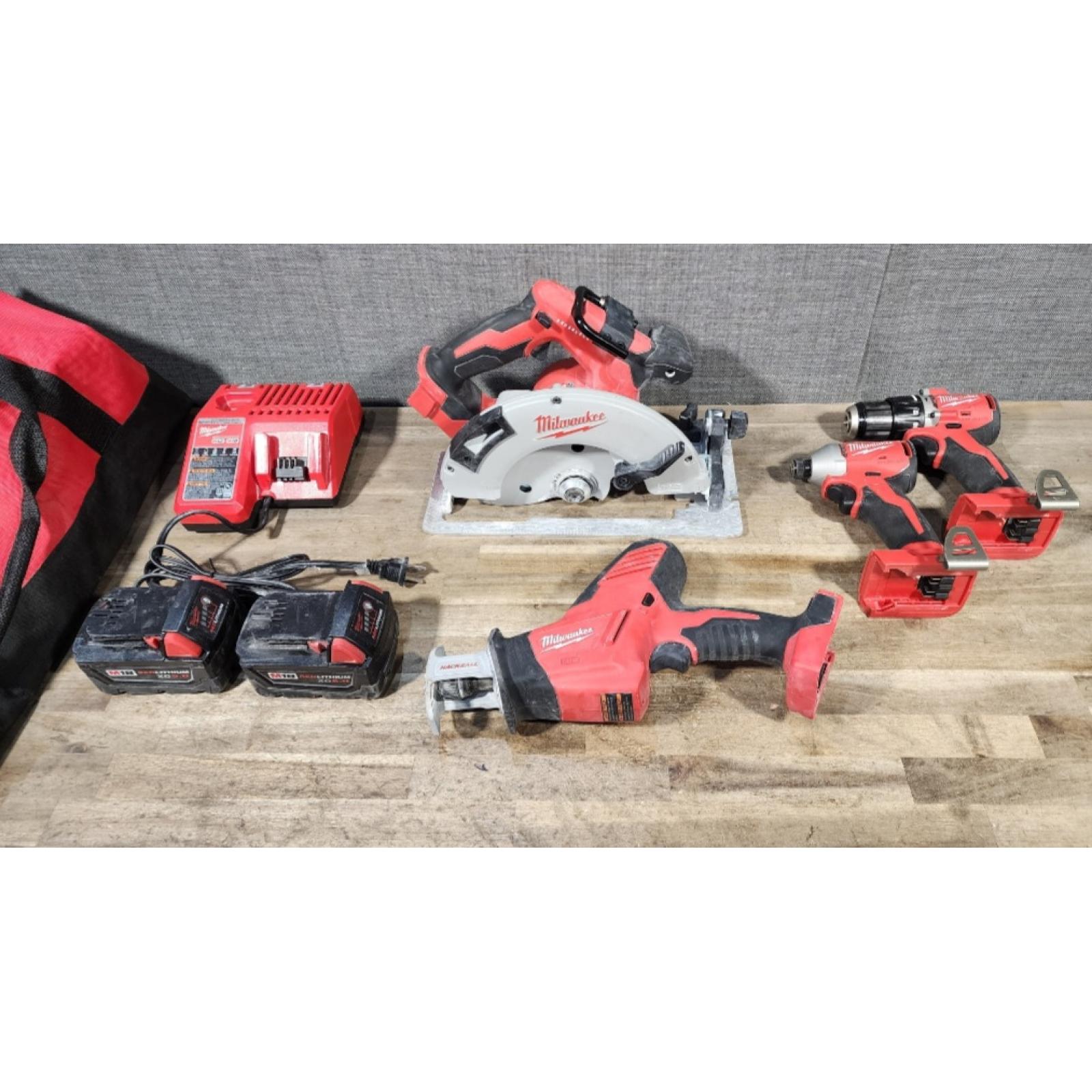 HOUSTON LOCATION - AS-IS MILWAUKEE 4 TOOL COMBO KIT W/ (2) BATTERY & CHARGER