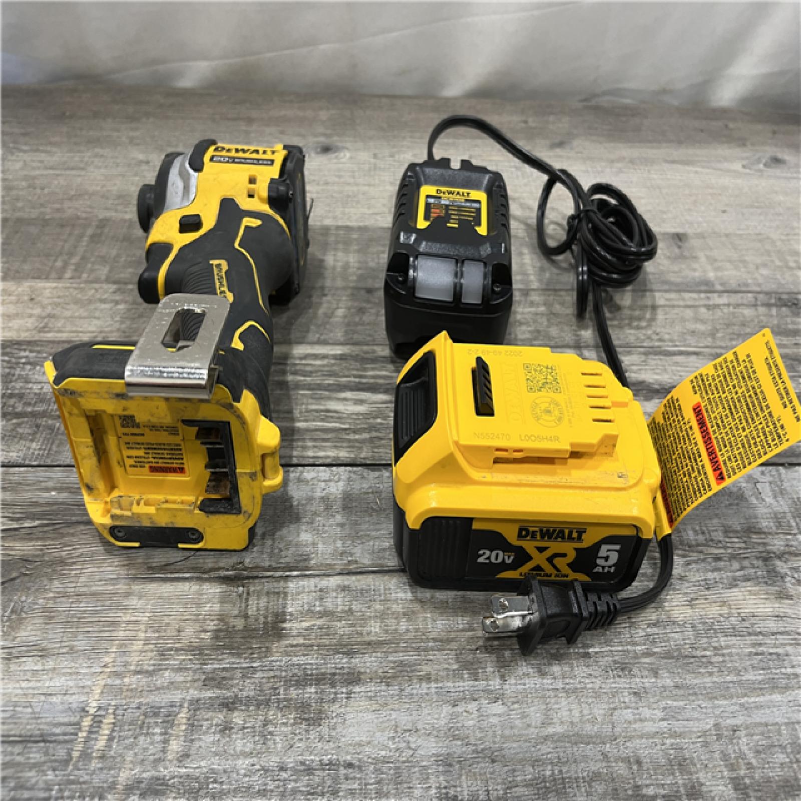 AS-IS DEWALT ATOMIC 20V MAX Lithium-Ion Cordless 1/4 in. Brushless Impact Driver Kit