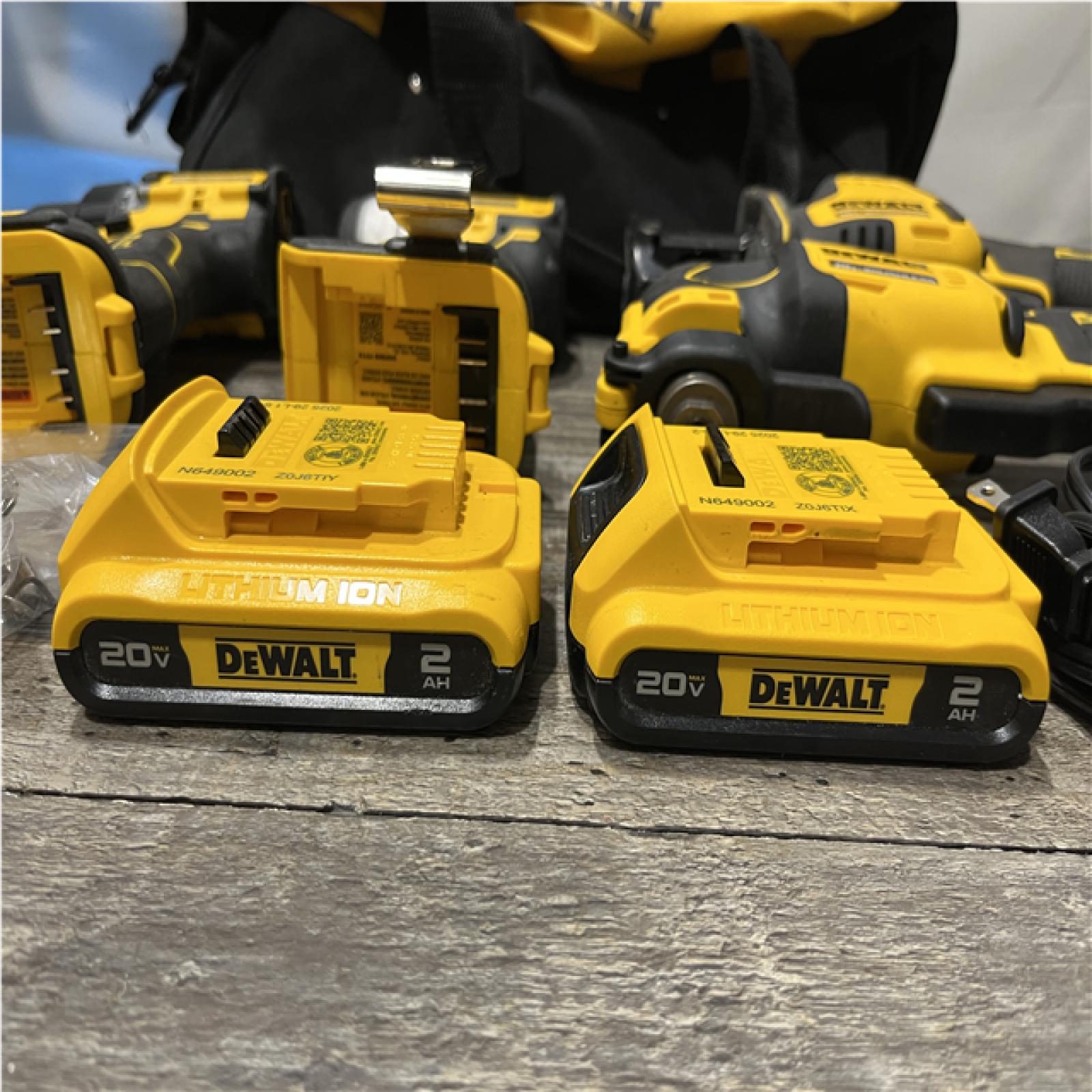 AS-IS DEWALT ATOMIC 20-Volt Lithium-Ion Cordless Brushless (4-Tool) Combo Kit
