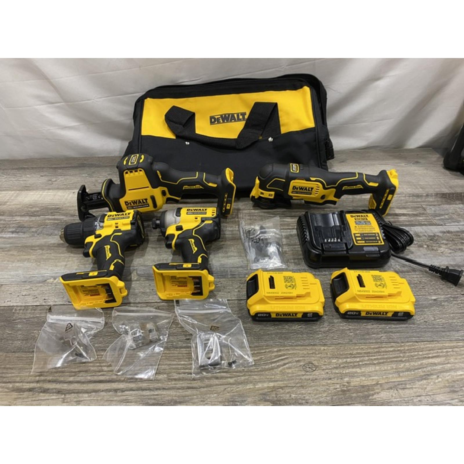 AS-IS DEWALT ATOMIC 20-Volt Lithium-Ion Cordless Brushless (4-Tool) Combo Kit