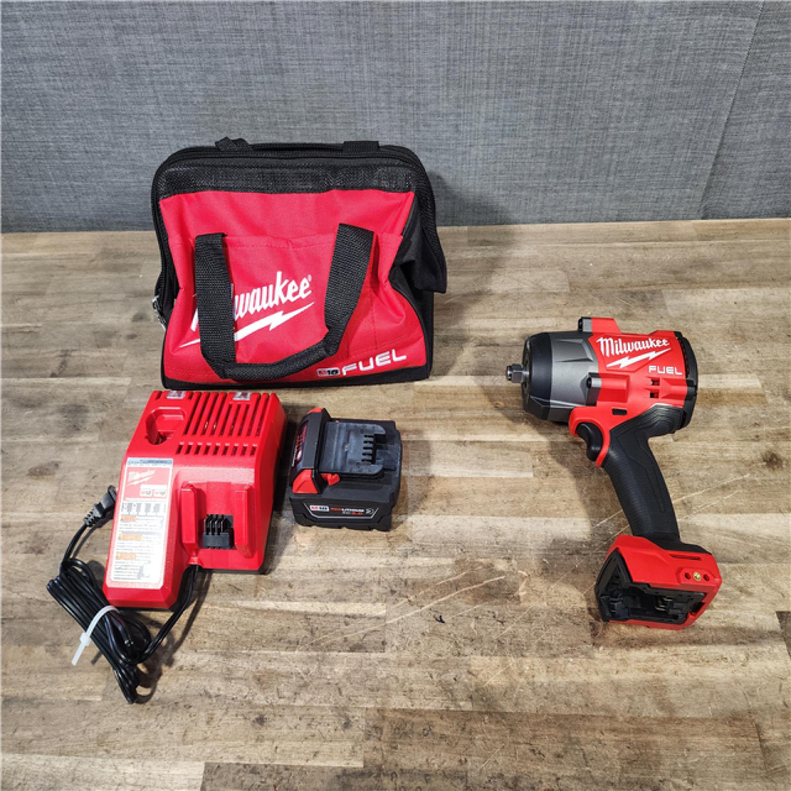 HOUSTON LOCATION - AS-IS (APPEARS LIKE NEW) Milwaukee M18 1/2 in. Cordless Brushless High Torque Impact Wrench Kit (Battery & Charger)