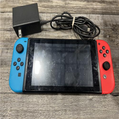 AS-IS Nintendo Switch with Neon Blue and Neon Red Joy-Con