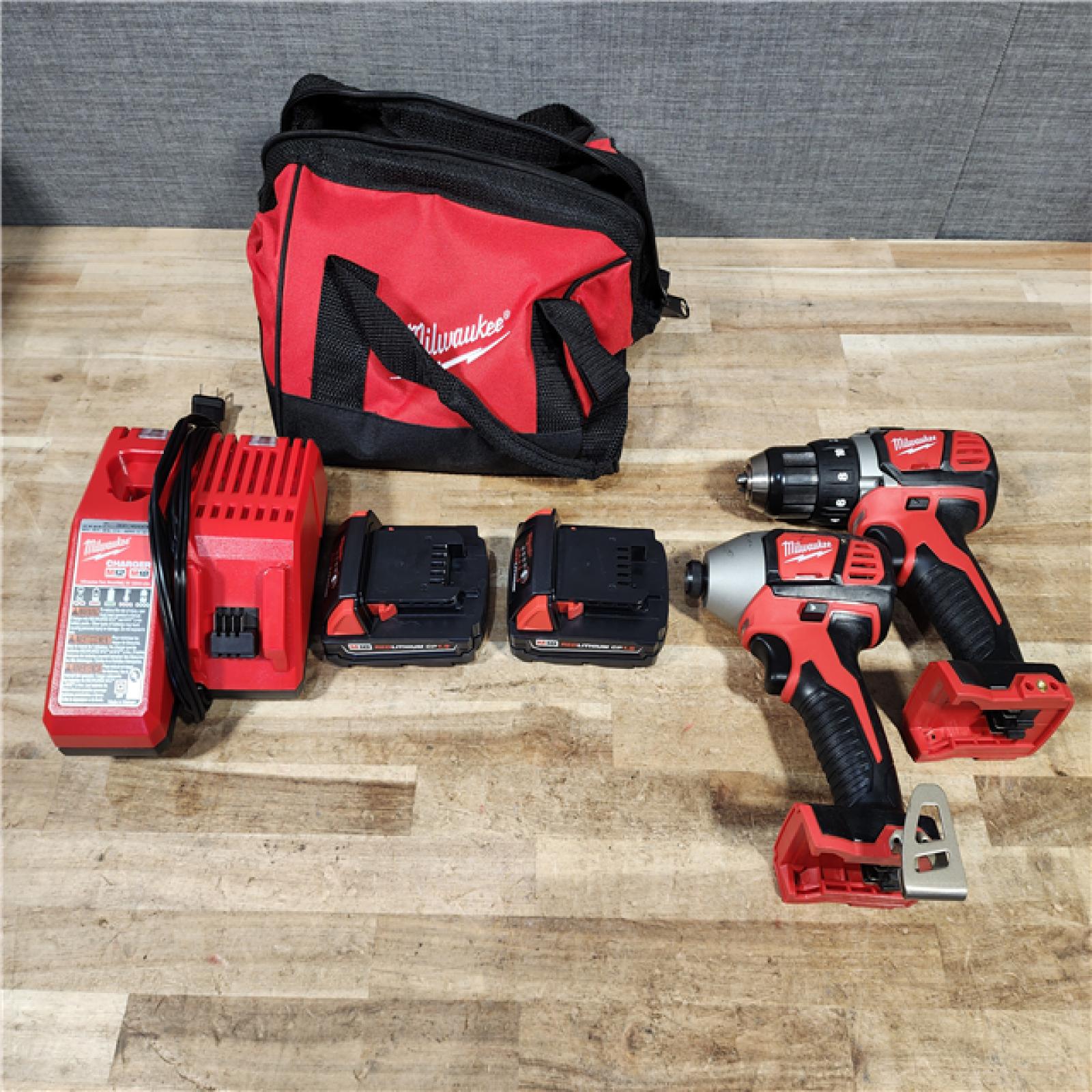 HOUSTON LOCATION - AS - IS Milwaukee 18V Lithium-Ion Cordless Drill Driver/Impact Driver Combo Kit