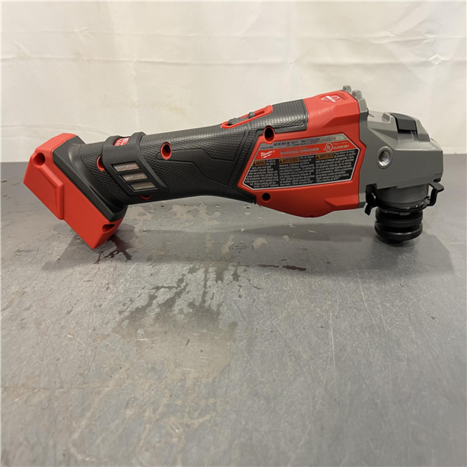 AS-IS - MILWAUKEE M18 FUEL 18V Lithium-Ion Brushless Cordless 4-1/2 in./6 in. Braking Grinder with Slide Switch