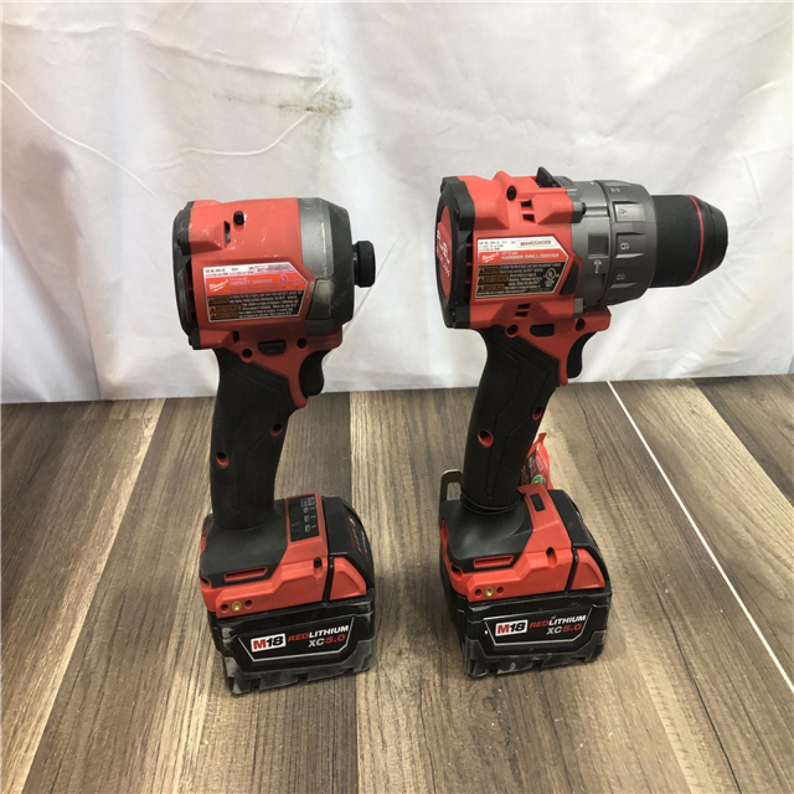 AS-IS Milwaukee FUEL 18V Lithium-Ion Brushless Cordless Hammer Drill and Impact Driver Combo Kit