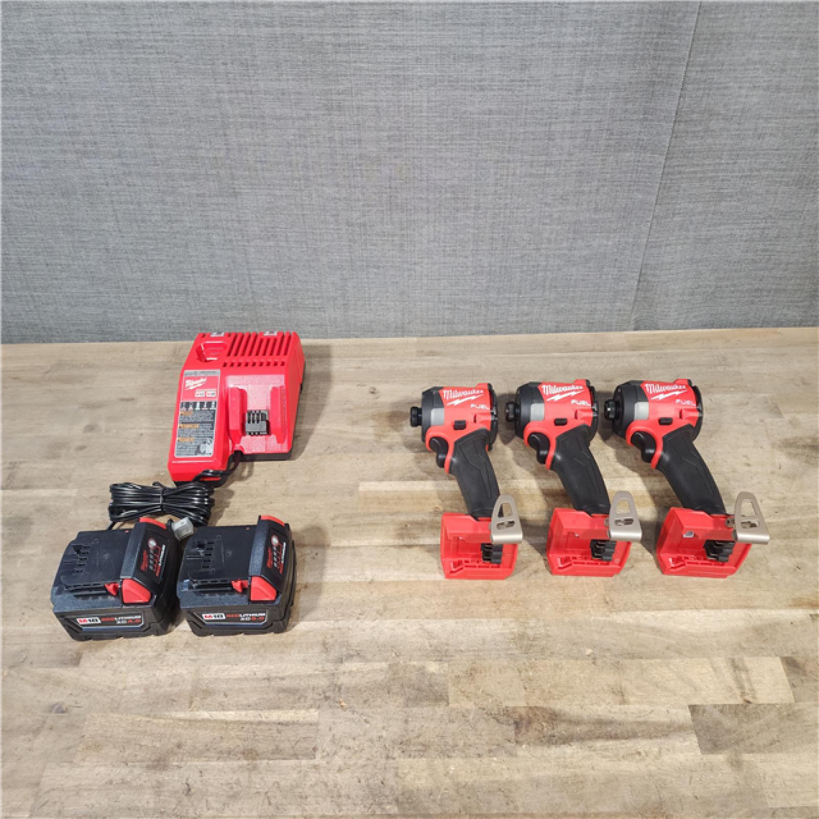 HOUSTON LOCATION - AS-IS (APPEARS LIKE NEW) (3) Milwaukee 2953-20 18V Lithium-Ion Brushless Cordless 1/4 Hex Impact Driver W/ (2) BATTERY & CHARGER
