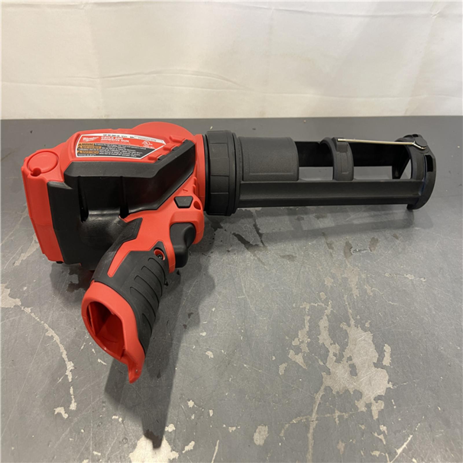 AS-IS - Milwaukee M12 12V Lithium-Ion Cordless 10 oz. Adhesive and Caulk Gun