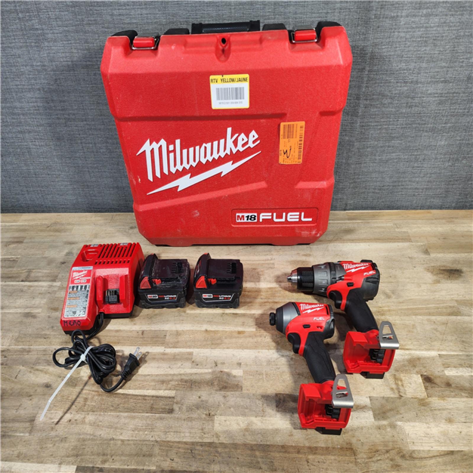 HOUSTON LOCATION - AS-IS Milwaukee M18 FUEL 18-Volt Lithium-Ion Brushless Cordless Hammer Drill & Impact Driver Combo Kit (2-Tool) w/(2) 5Ah Batteries